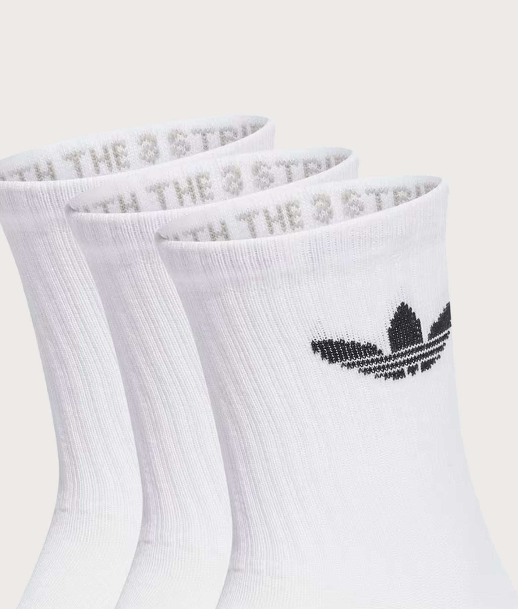 adidas Originals 3 Pack Trefoil Cushion Crew Socks in White at EQVVS Menswear. Detail shot.