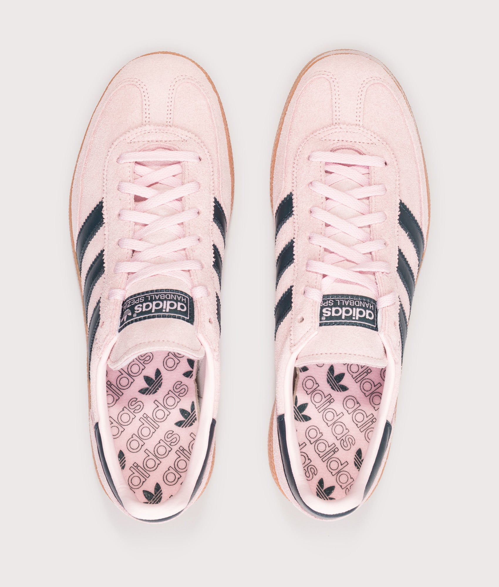 adidas Originals Handball Spezial Trainers in Clear Pink, Arctic Night and Gum at EQVVS Menswear. Top shot.