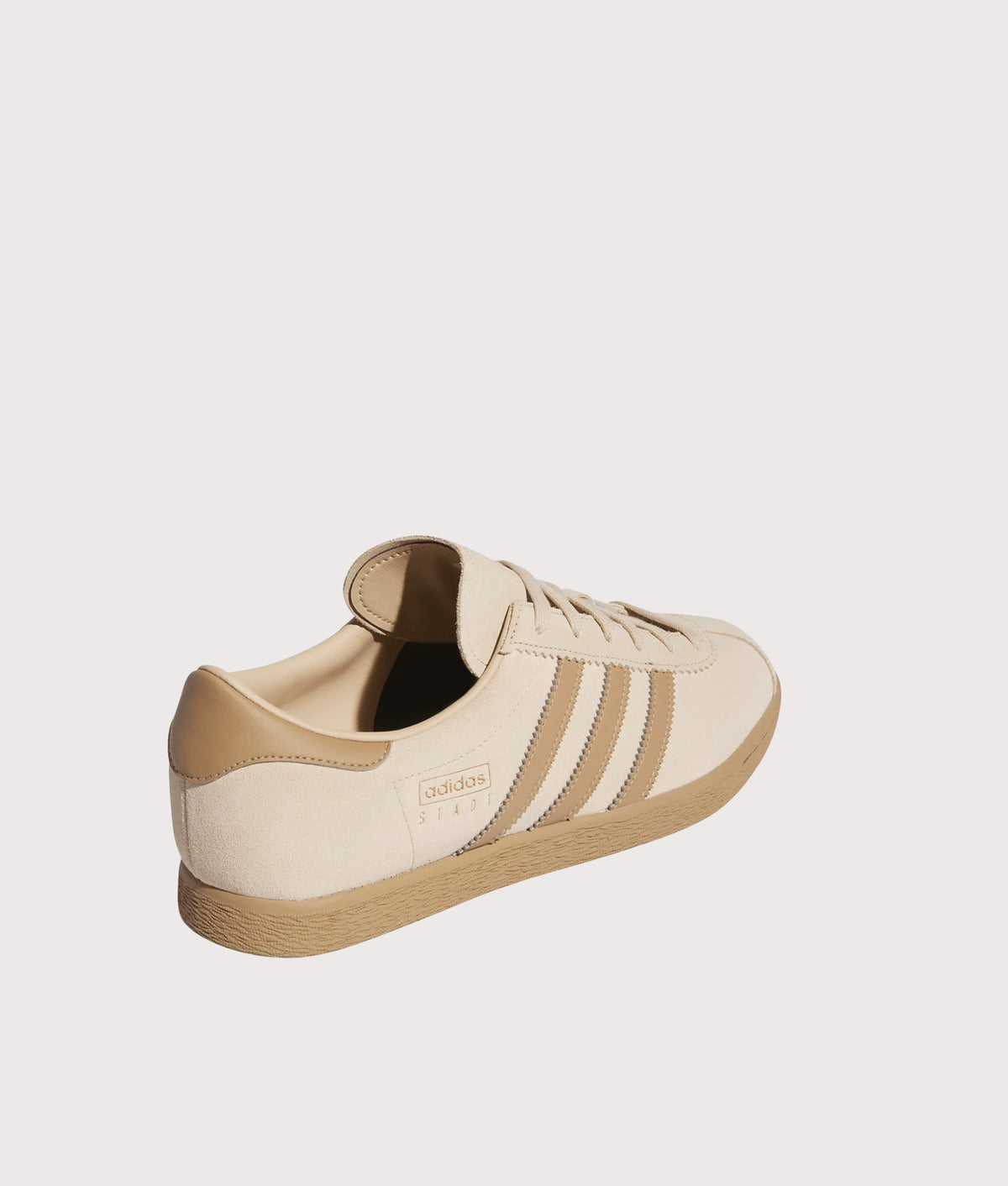adidas Originals Stadt Trainers in Magic Beige, Cardboard and Gold Metallic at EQVVS Menswear. Angled back shot.
