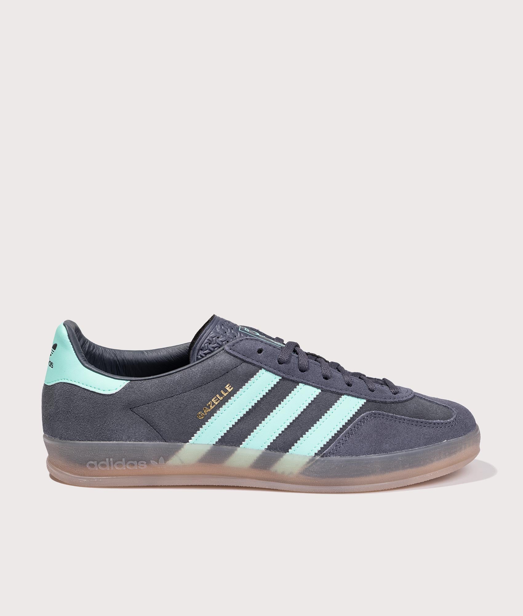 Gazelle Indoor Trainers in Shadow Navy by adidas Originals at EQVVS. Side Angle Shot.