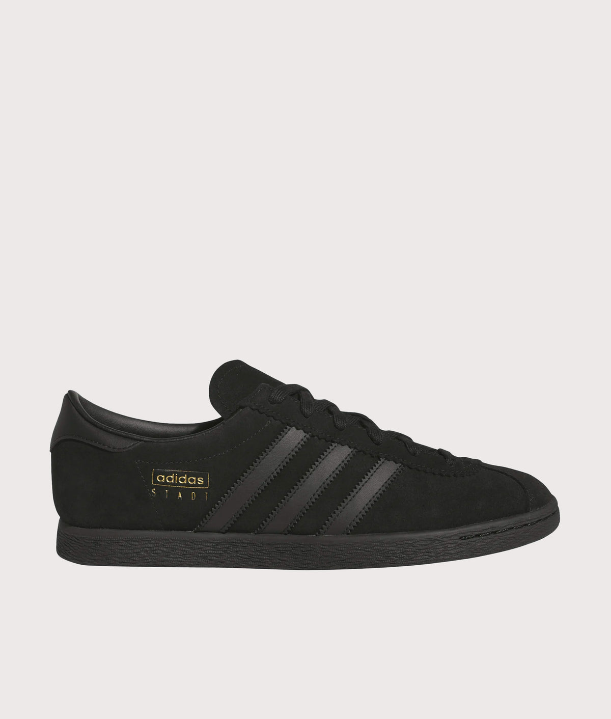 adidas Originals Stadt Trainers  in the Core Black, Core Black and Carbon at EQVVS Menswear. Side shot.
