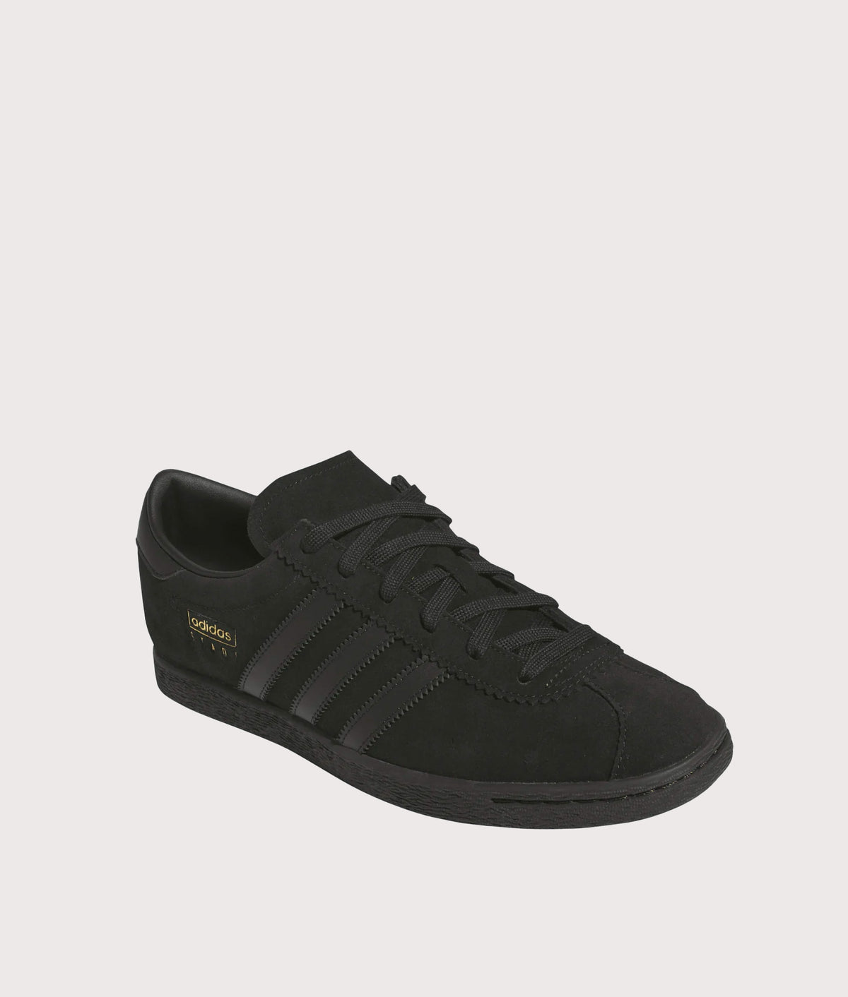 adidas Originals Stadt Trainers  in the Core Black, Core Black and Carbon at EQVVS Menswear. Angled front shot.