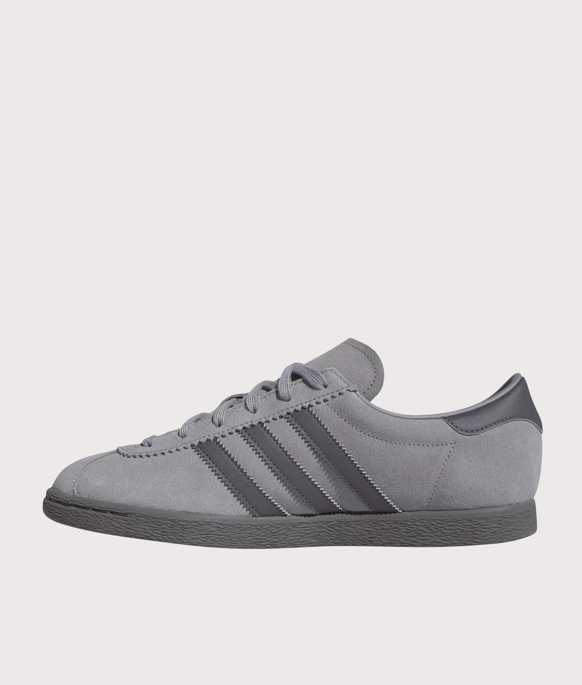 adidas Originals Stadt Trainers in Grey Three, Grey Five and Gold Metallic at EQVVS Menswear. Side shot.
