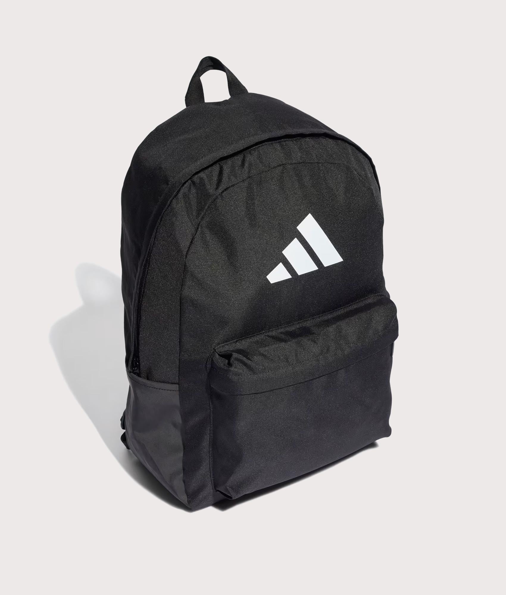 adidas Originals Classic 3 Bars Logo Backpack in Black at EQVVS Menswear. Angled front shot.