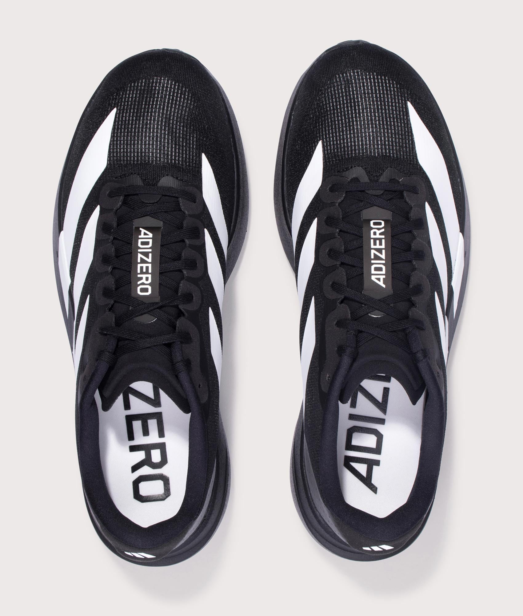 Adizero Evo SL Trainers in Core Black/Cloud White | adidas Originals | EQVVS | Top shot 