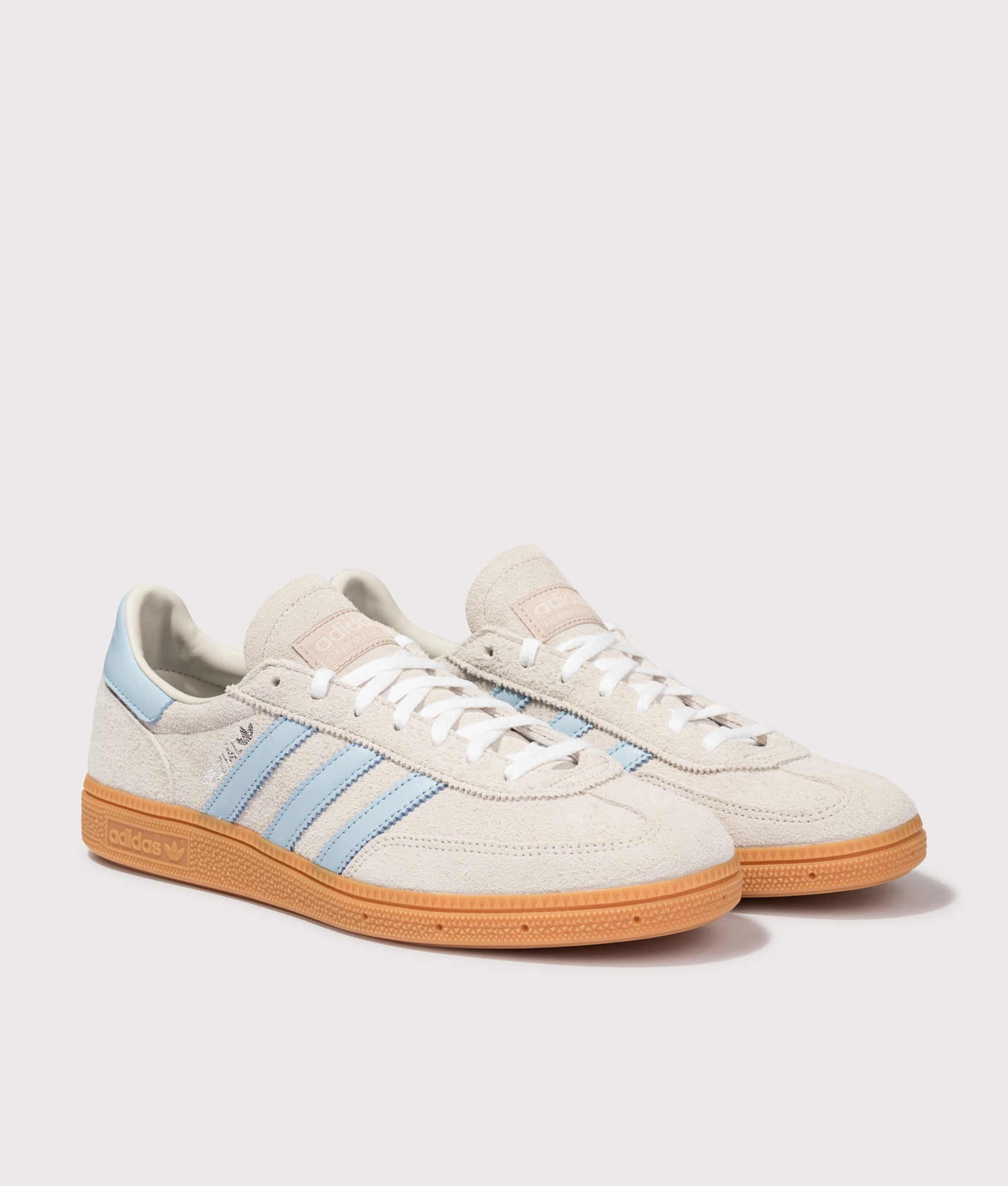 adidas Originals Handball Spezial Trainers in Alumina, Clear Sky and Gum 1 at EQVVS Menswear. Angled front shot.
