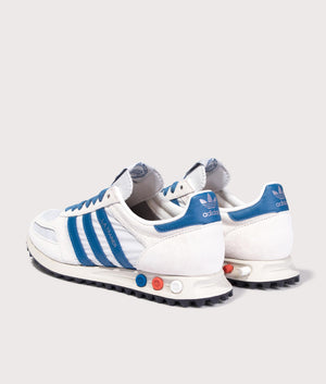 Adidas Originals LA Trainers in Off White, Dark Marine and Crystal White at EQVVS Menswear. Angled Back shot.
