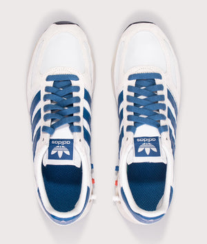 Adidas Originals LA Trainers in Off White, Dark Marine and Crystal White at EQVVS Menswear. Above shot.
