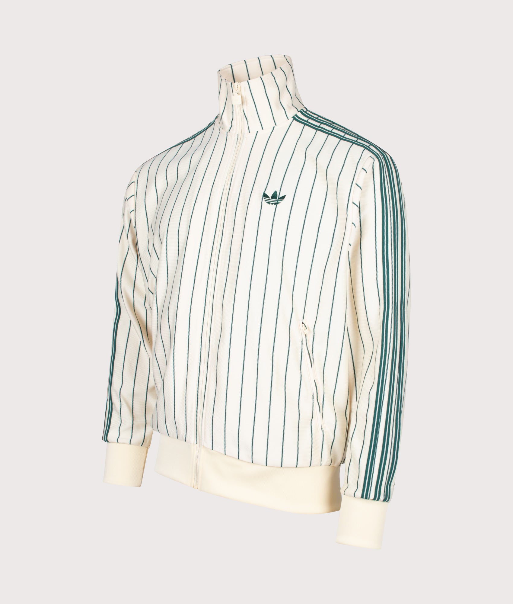 adidas Originals Loose Fit Firebird Pinstripe Track Top in in Pin stripe Warm Vanilla at EQVVS Menswear. Angled front shot.