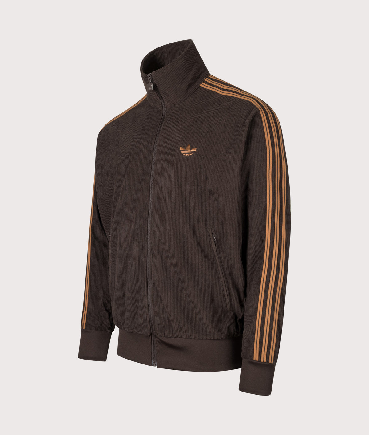 adidas Originals Loose Fit Firebird Corduroy Track Top in Aurora Coffee at EQVVS Menswear. Angled front shot.