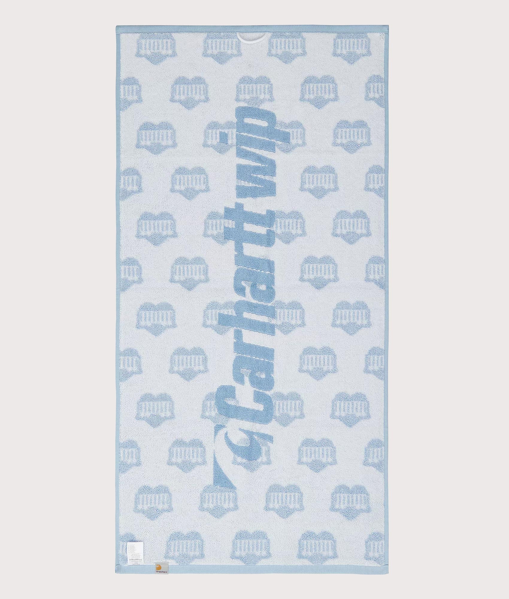 Carharrt WIP  Heart Train Sport Towel in Blubird and White. Shot at EQVVS.  Under shot 