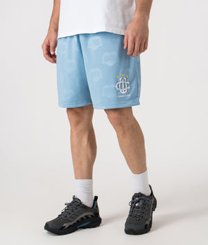 Relaxed Fit Hartt Football Shorts in Heart Train Jacquard and Bluebird. | Carhartt WIP | Shot at EQVVS | Front angle shot 