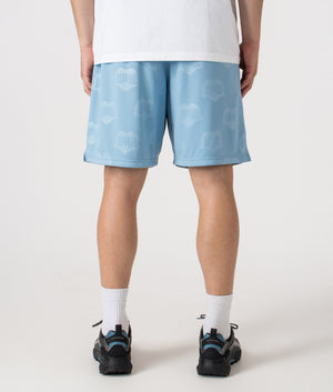 Relaxed Fit Hartt Football Shorts in Heart Train Jacquard and Bluebird. | Carhartt WIP | Shot at EQVVS | Back shot 