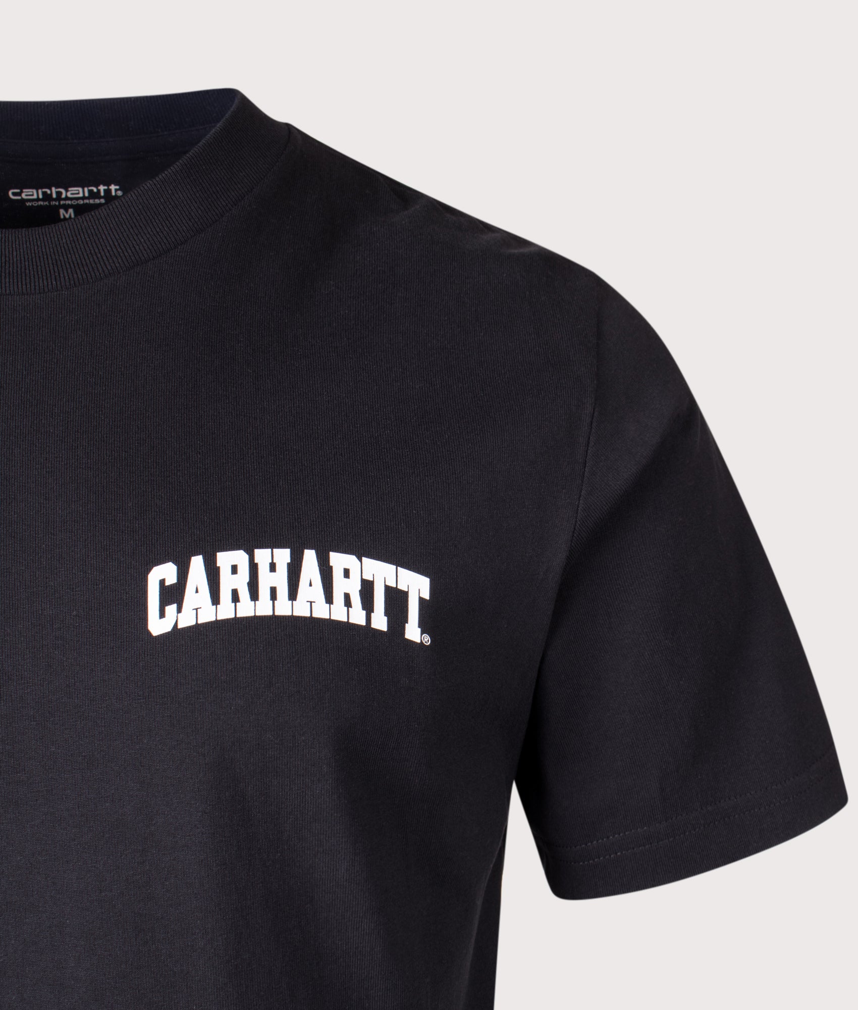 Carhartt WIP University Script T-Shirt in Black at EQVVS Menswear. Detail shot.