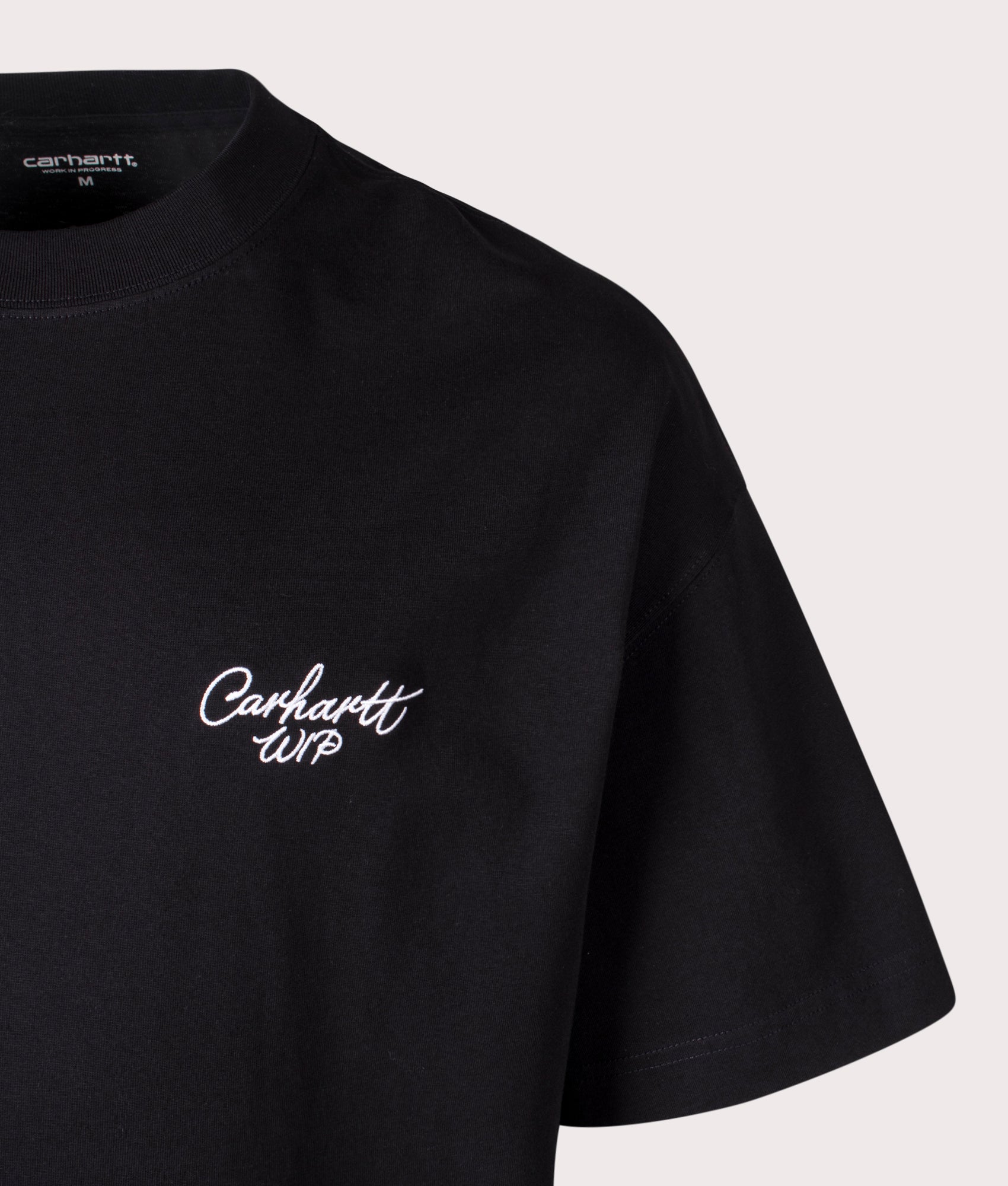 Carhartt WIP Signature Script T-Shirt in Black/White EQVVS Menswear. Detail shot.