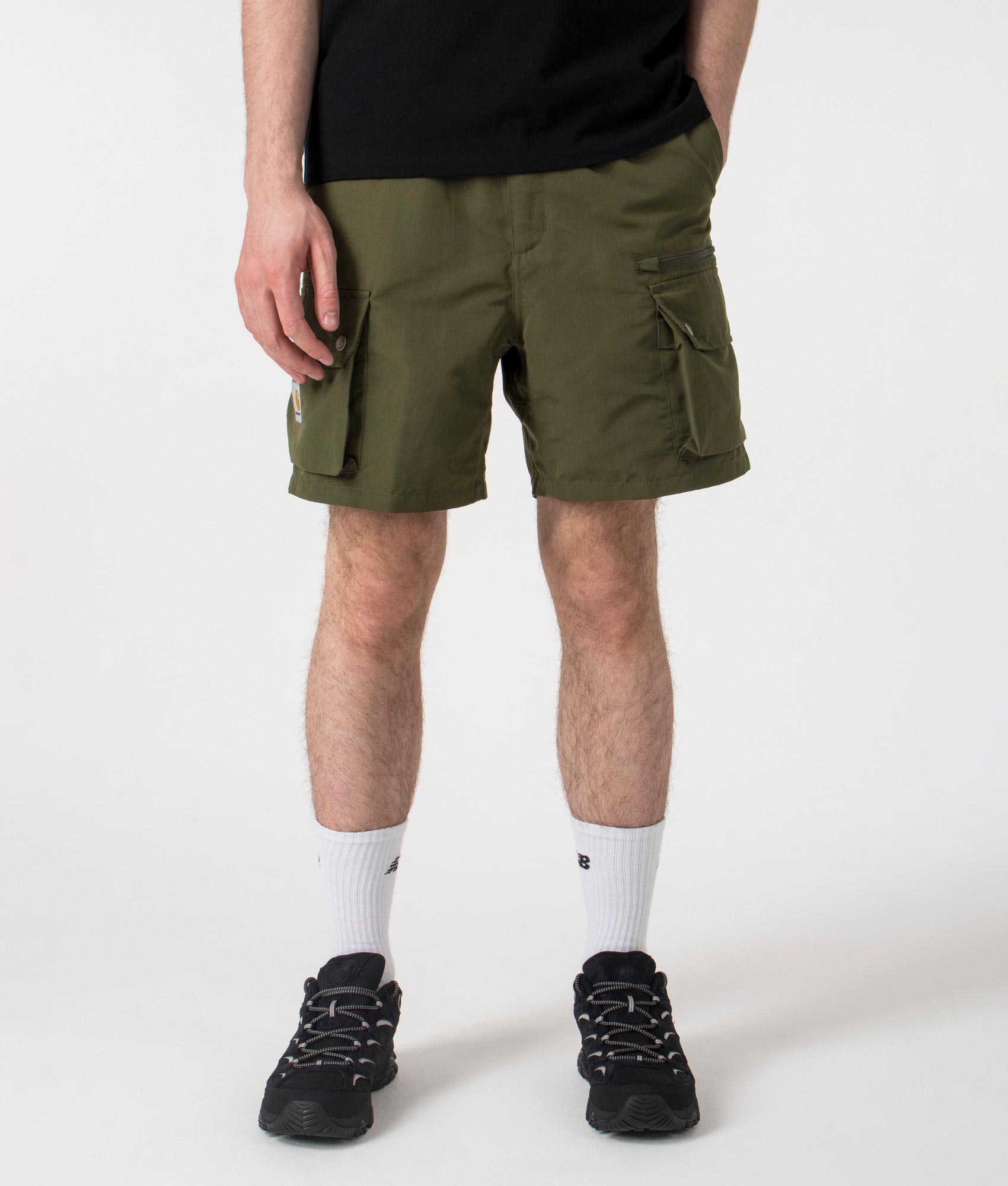 Carhartt WIP Regular Fit Irwin Shorts in Turtle at EQVVS. Front shot. 