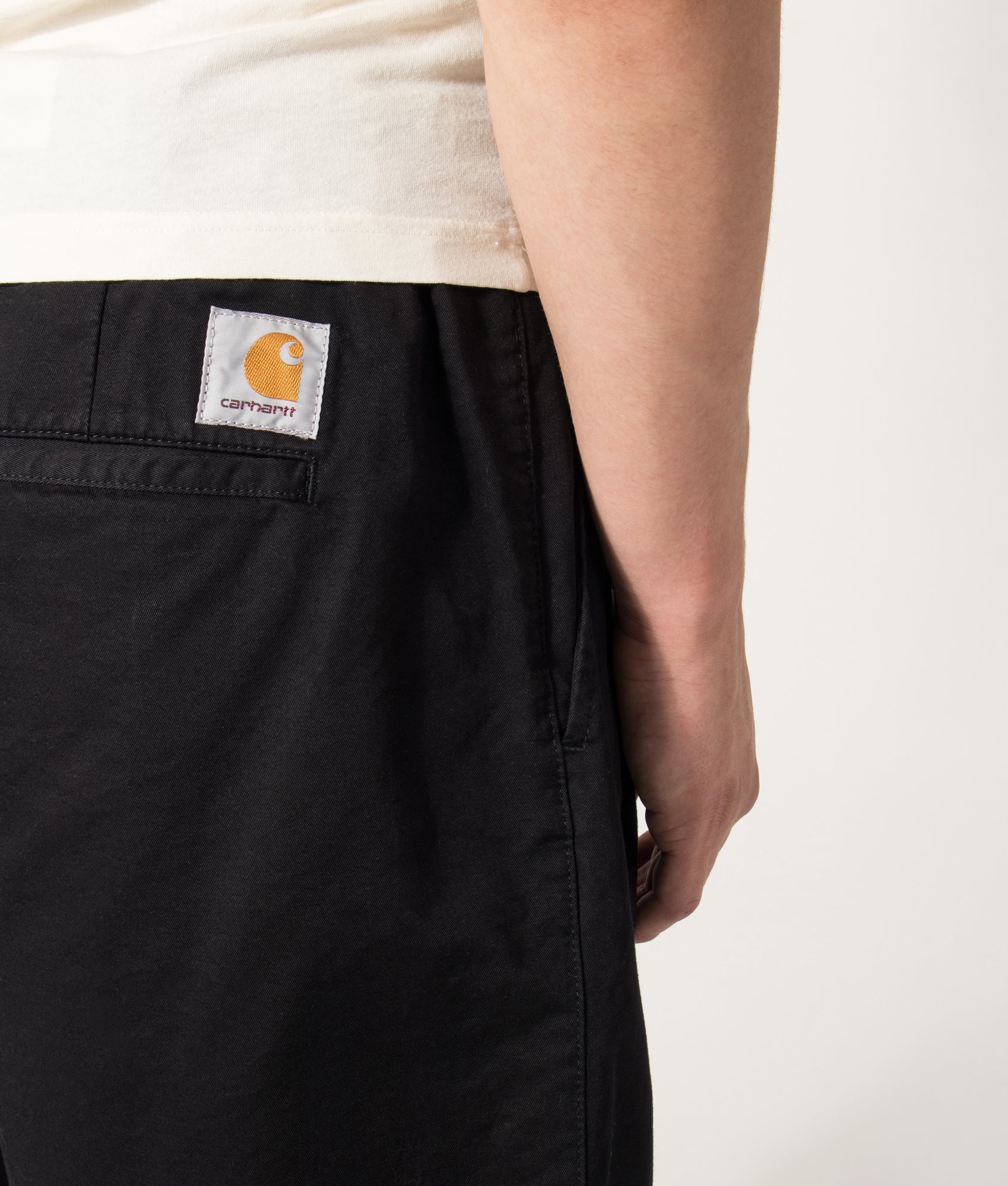 Carhartt WIP Marv Shorts in Stone Washed Black at EQVVS Menswear.  Detail shot.