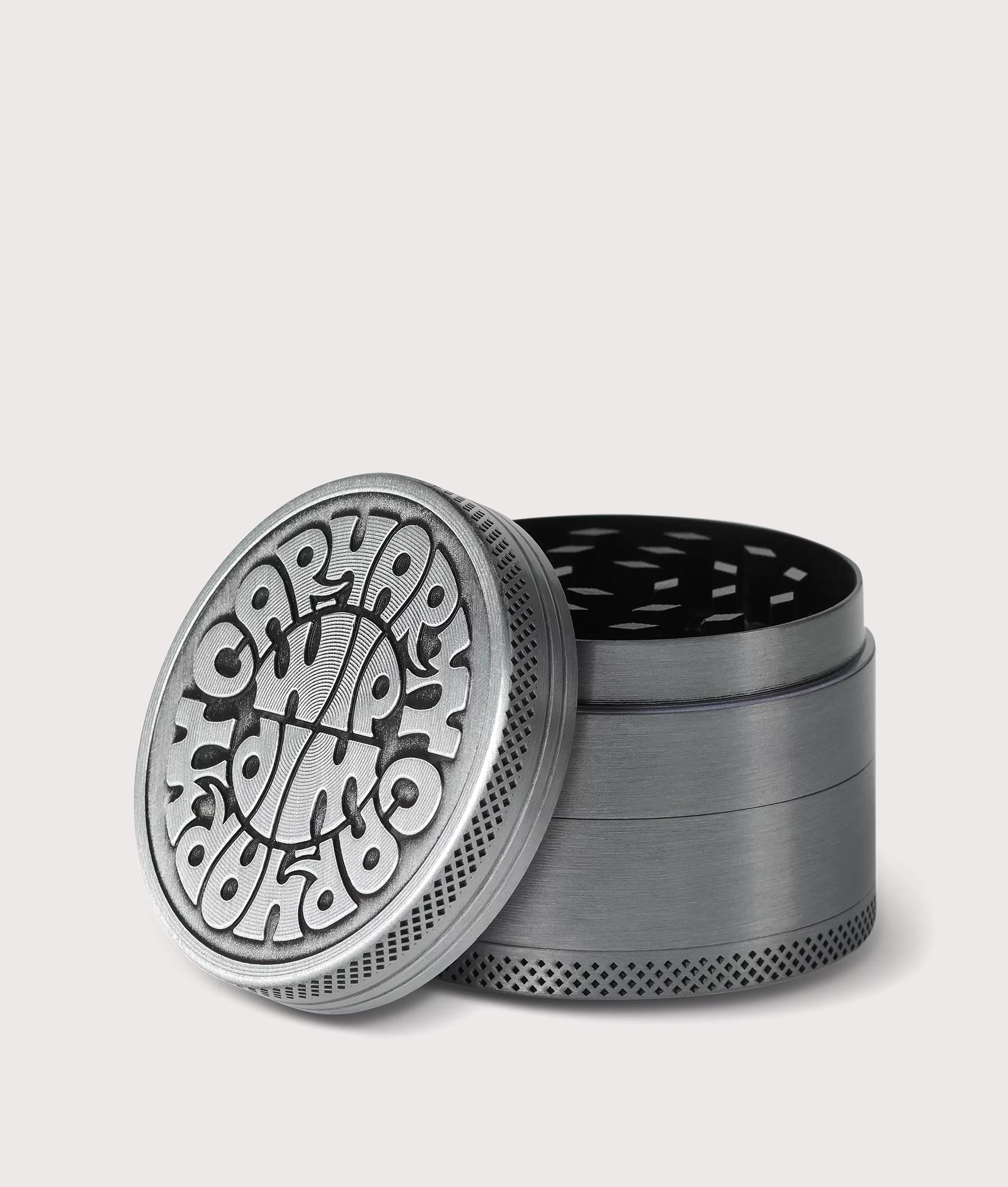 Carharrt WIP Jazzy Grinder in Silver. Shot at EQVVS. Lid shot 