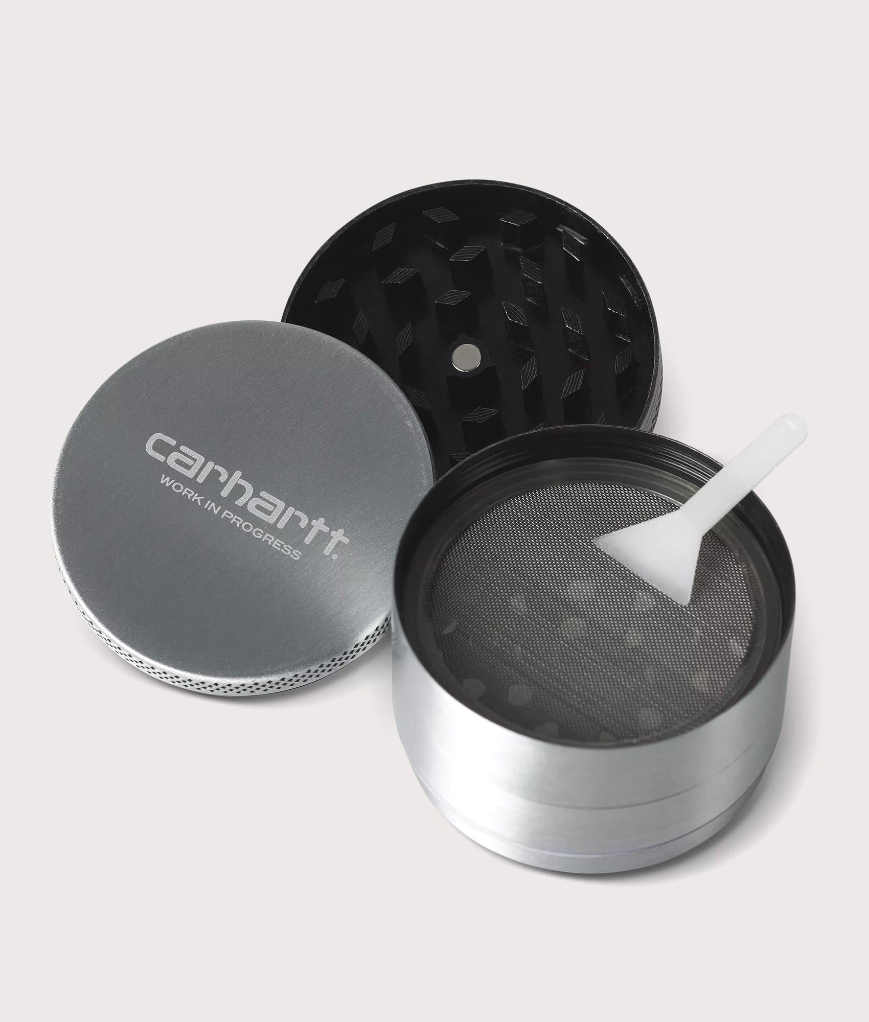 Carharrt WIP Jazzy Grinder in Silver. Shot at EQVVS. Compartment shot 