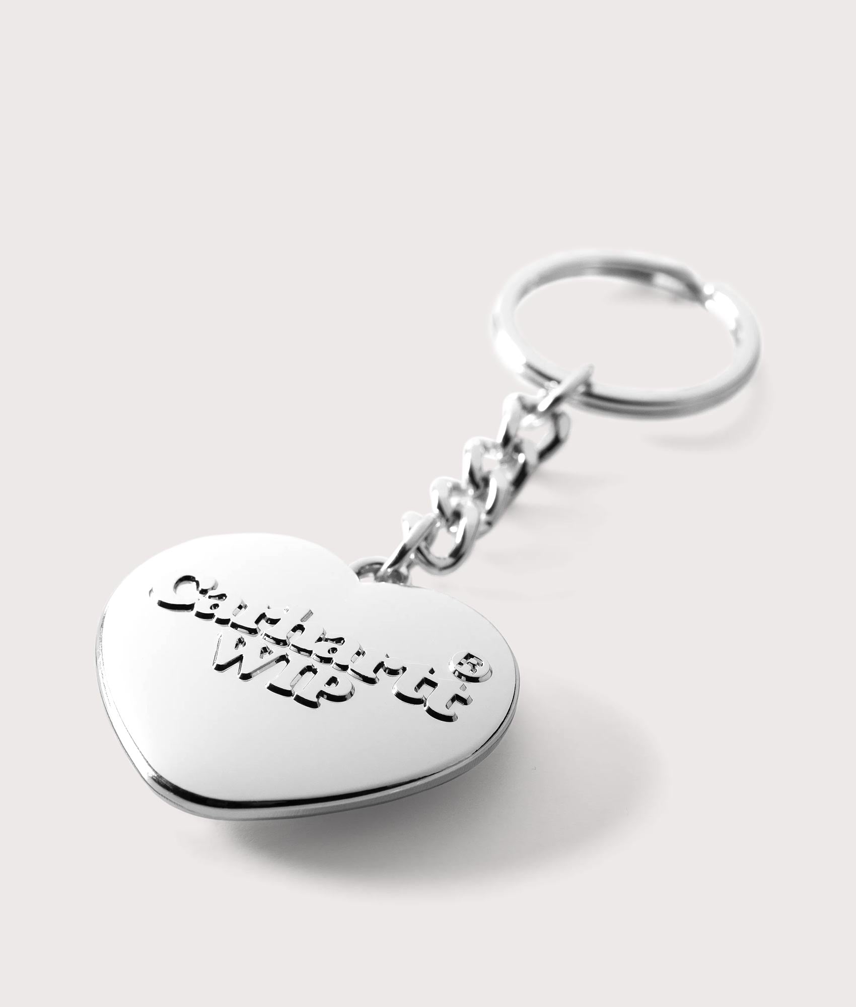 Carharrt WIP  Heart Keychain in Silver. Shot at EQVVS. Angle shot 