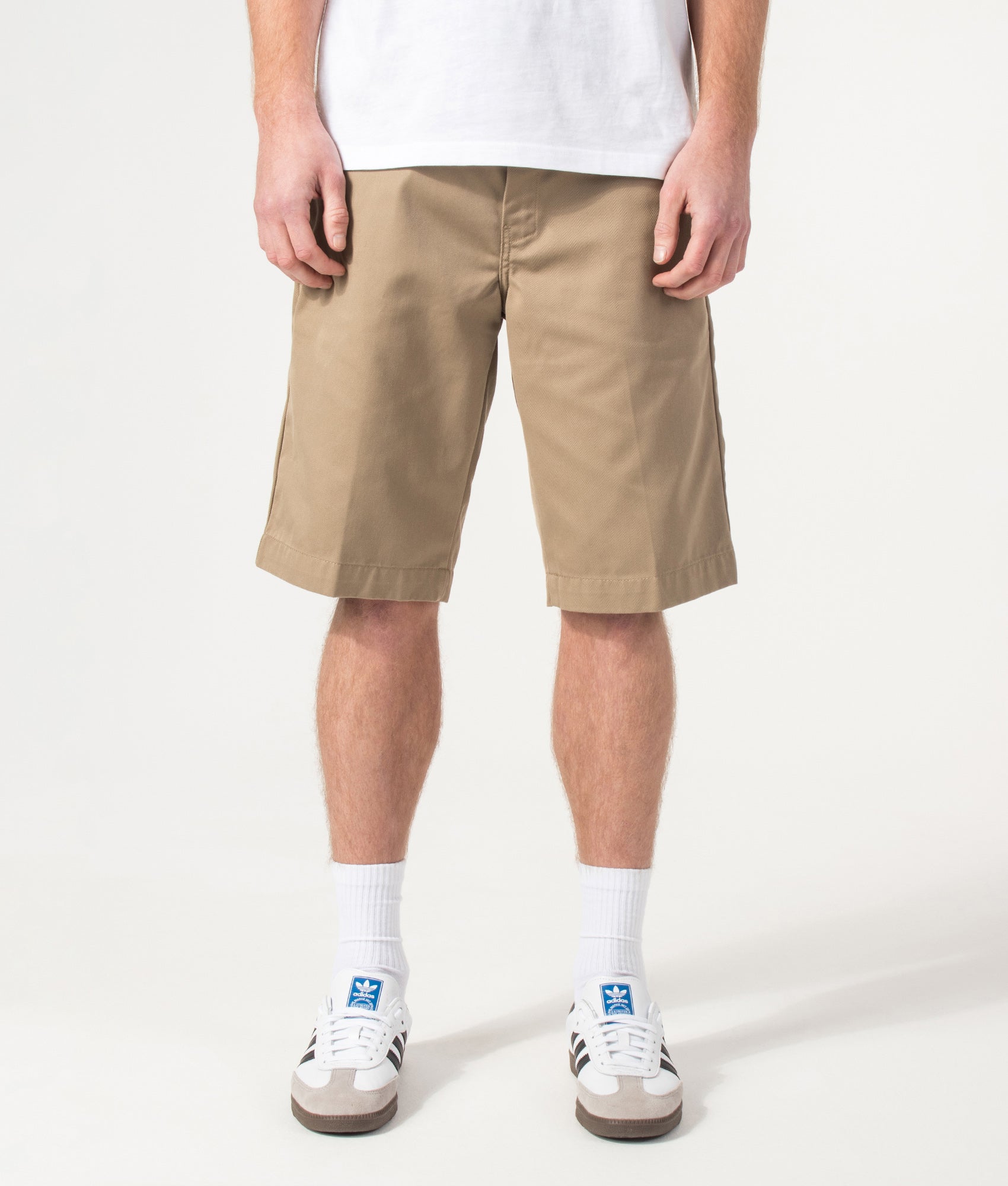 Carhartt WIP Relaxed Fit Master Shorts  in Leather at EQVVS Menswear. Model front shot.