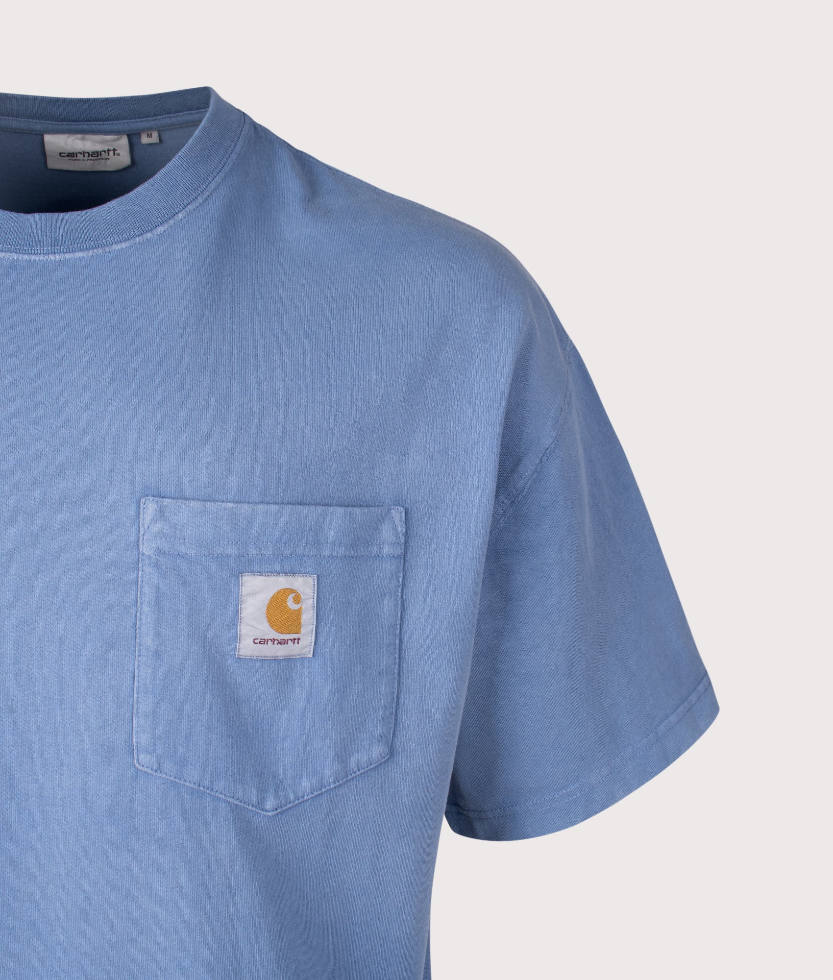 Carhartt WIP Boxy Loose Fit Hudson Pocket T-Shirt in Sorrent at EQVVS Menswear. Detail shot.