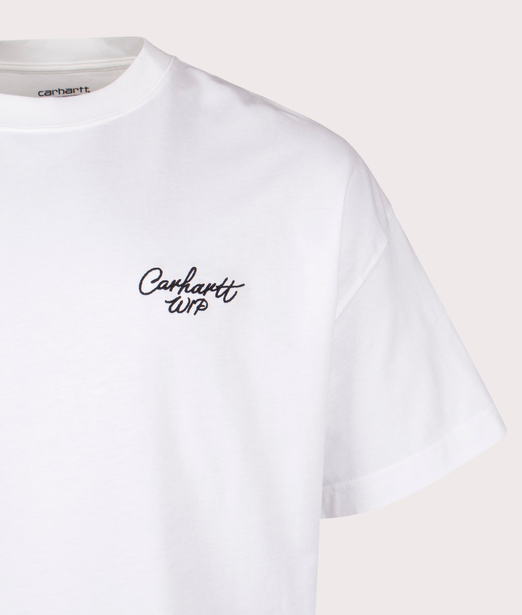 Carhartt WIP Boxy Loose Fit Signature Script T-Shirt in White and Black at EQVVS Menswear. Detail shot.
