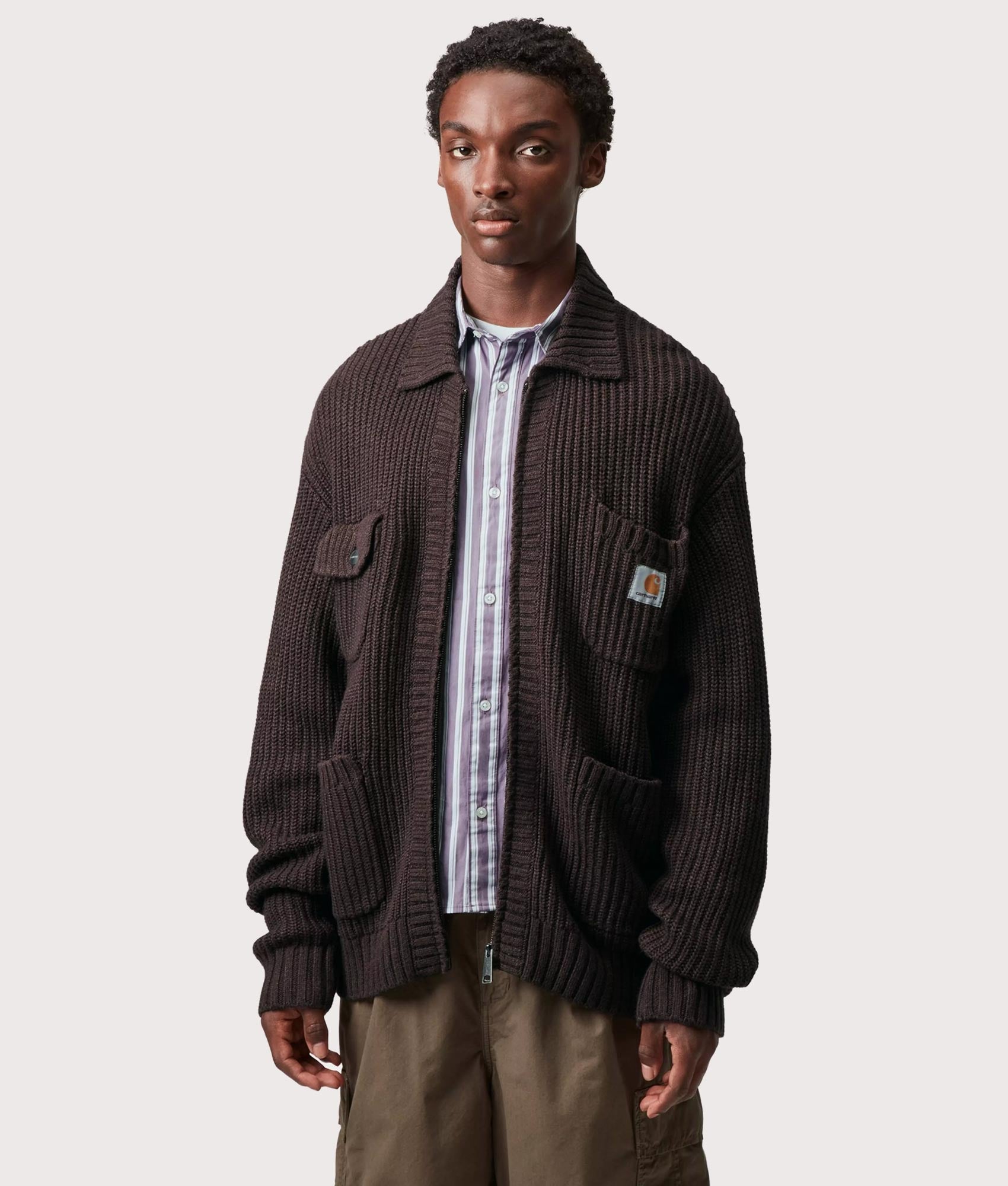 Carhartt WIP Chore Knit Jacket in Palisander at EQVVS Menswear. Model front shot.
