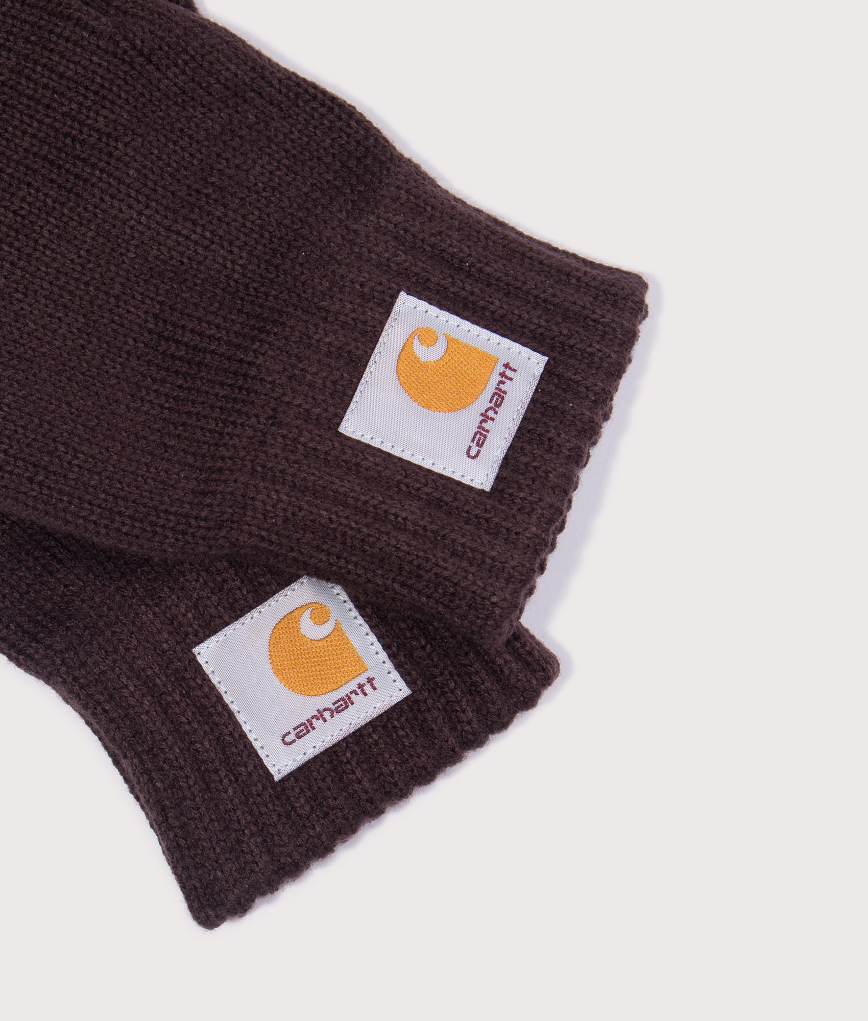 Carhartt WIP Watch Gloves in Palisander at EQVVS Menswear. Detail shot.