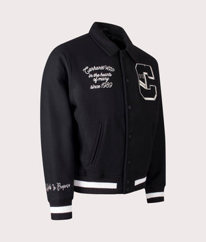 Carhartt WIP World Class Varsity in Black at EQVVS Menswear. Angled shot.