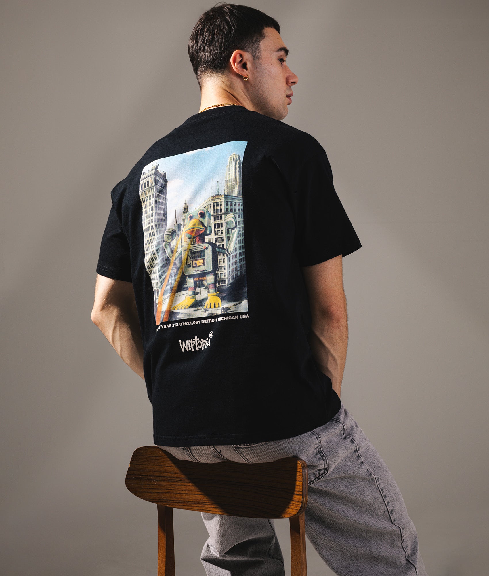 Relaxed Fit Wiptopia T-Shirt in Black. 100% Cotton| Carhartt WIP | Shot at EQVVS | Back promo shot