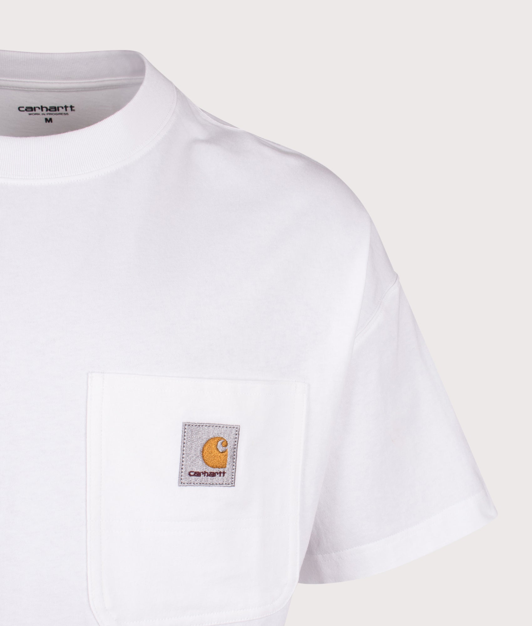 Carhartt WIP Boxy Loose Fit Work Pocket T-Shirt in White at EQVVS Menswear. Detail shot.