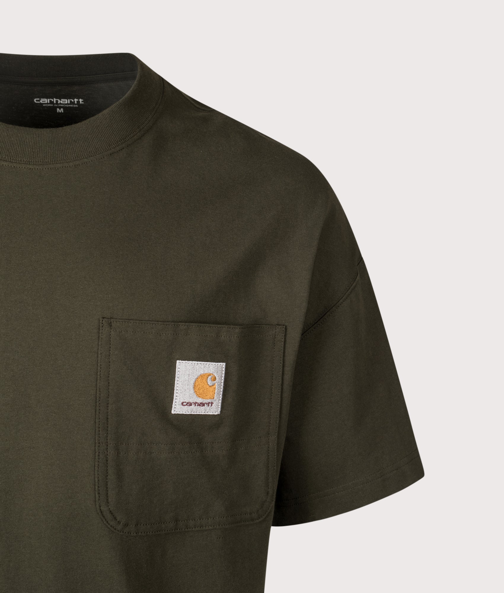 Carhartt WIP Boxy Loose Fit Work Pocket T-Shirt in Olive at EQVVS Menswear. Detail shot.