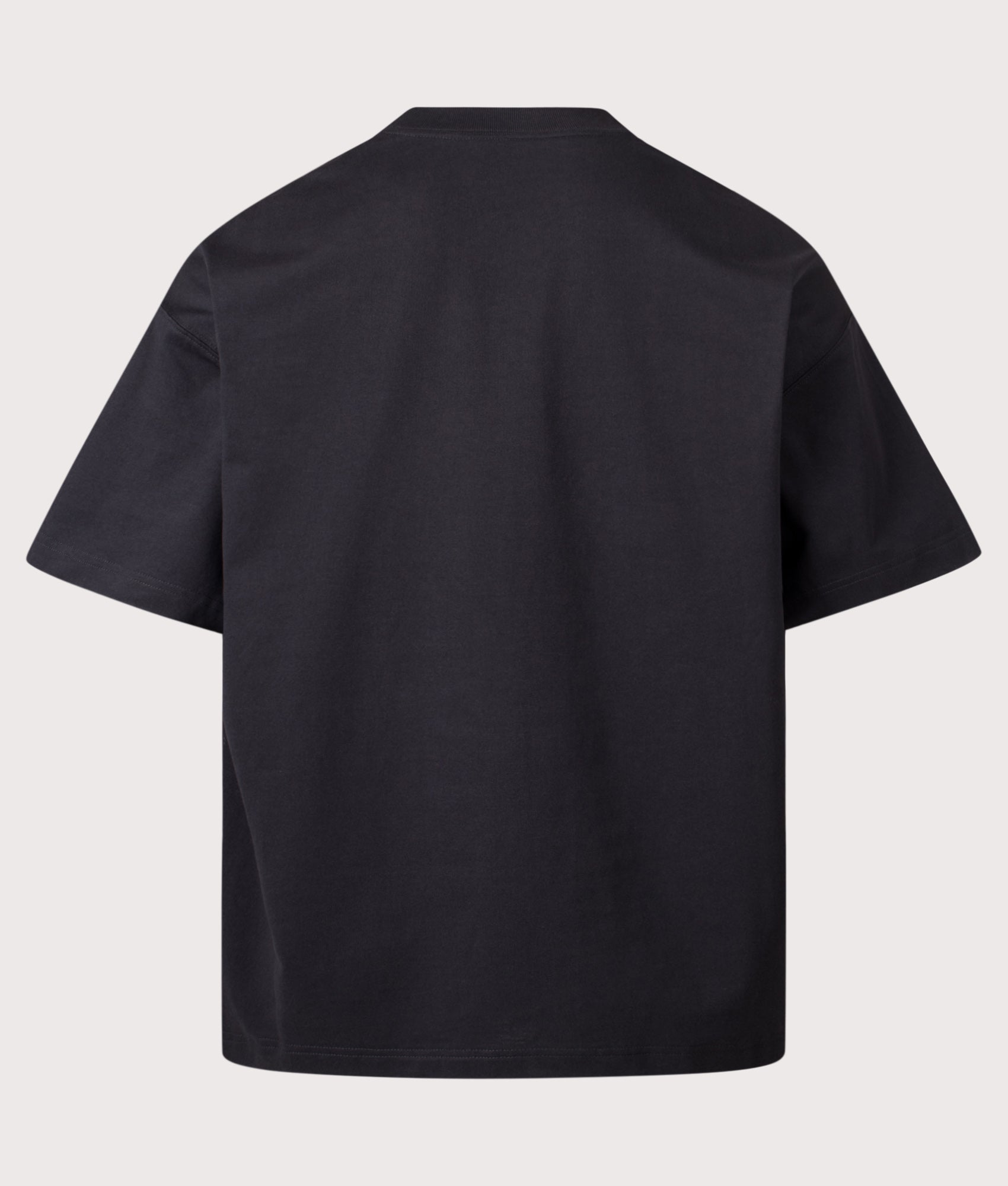 Carhartt WIP Boxy Loose Fit Work Pocket T-Shirt in Black at EQVVS Menswear. Back shot.