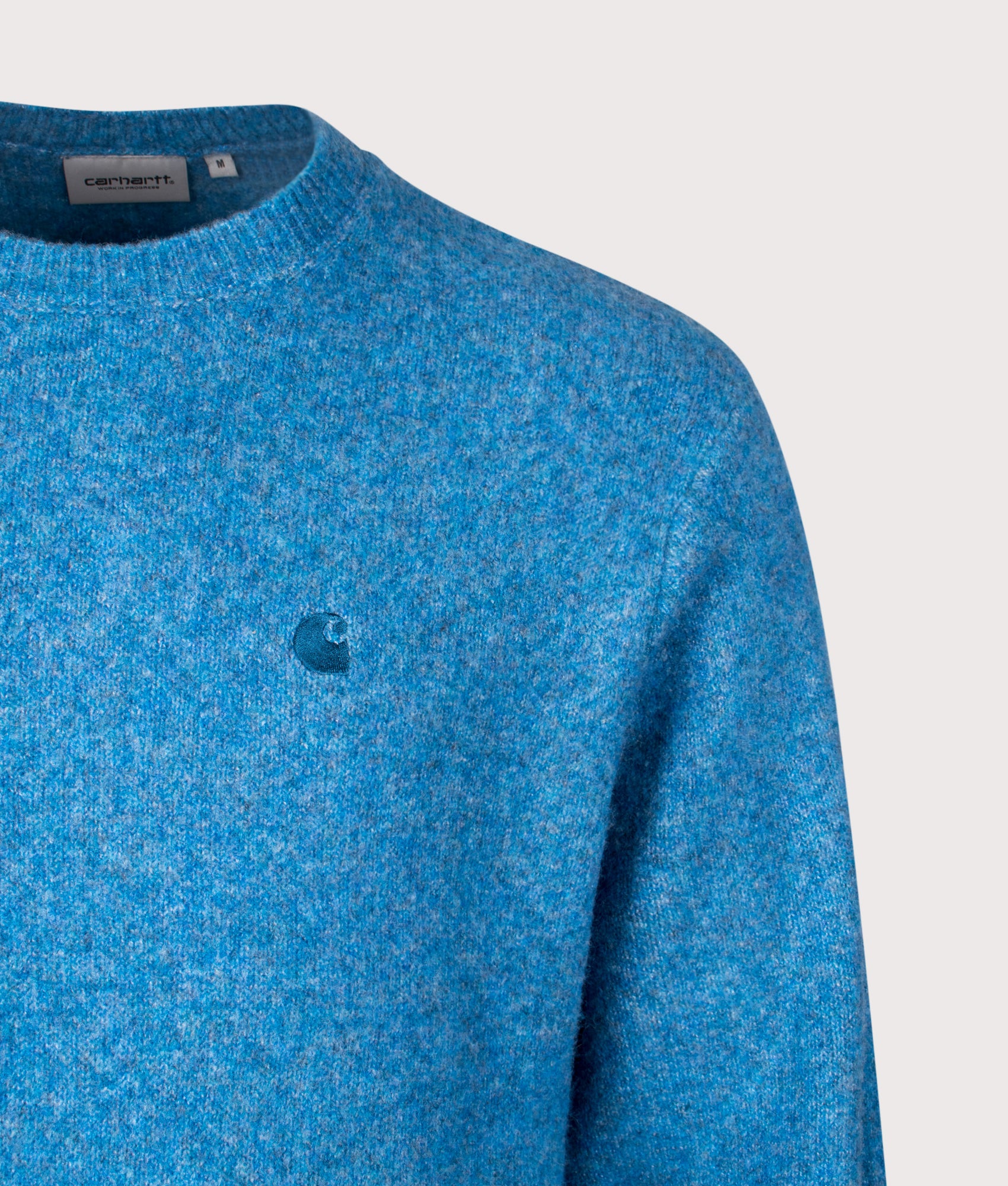 Relaxed Fit Curtis Jumper in Tangled Angelite | Carhartt WIP | Shot at EQVVS | Front detail shot 