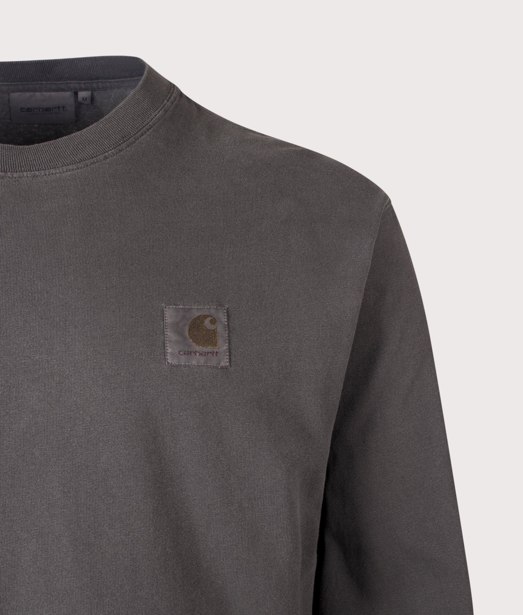 Carhartt WIP Loose Fit Vista Long Sleeve T-Shirt in Black at EQVVS Menswear. Detail shot.