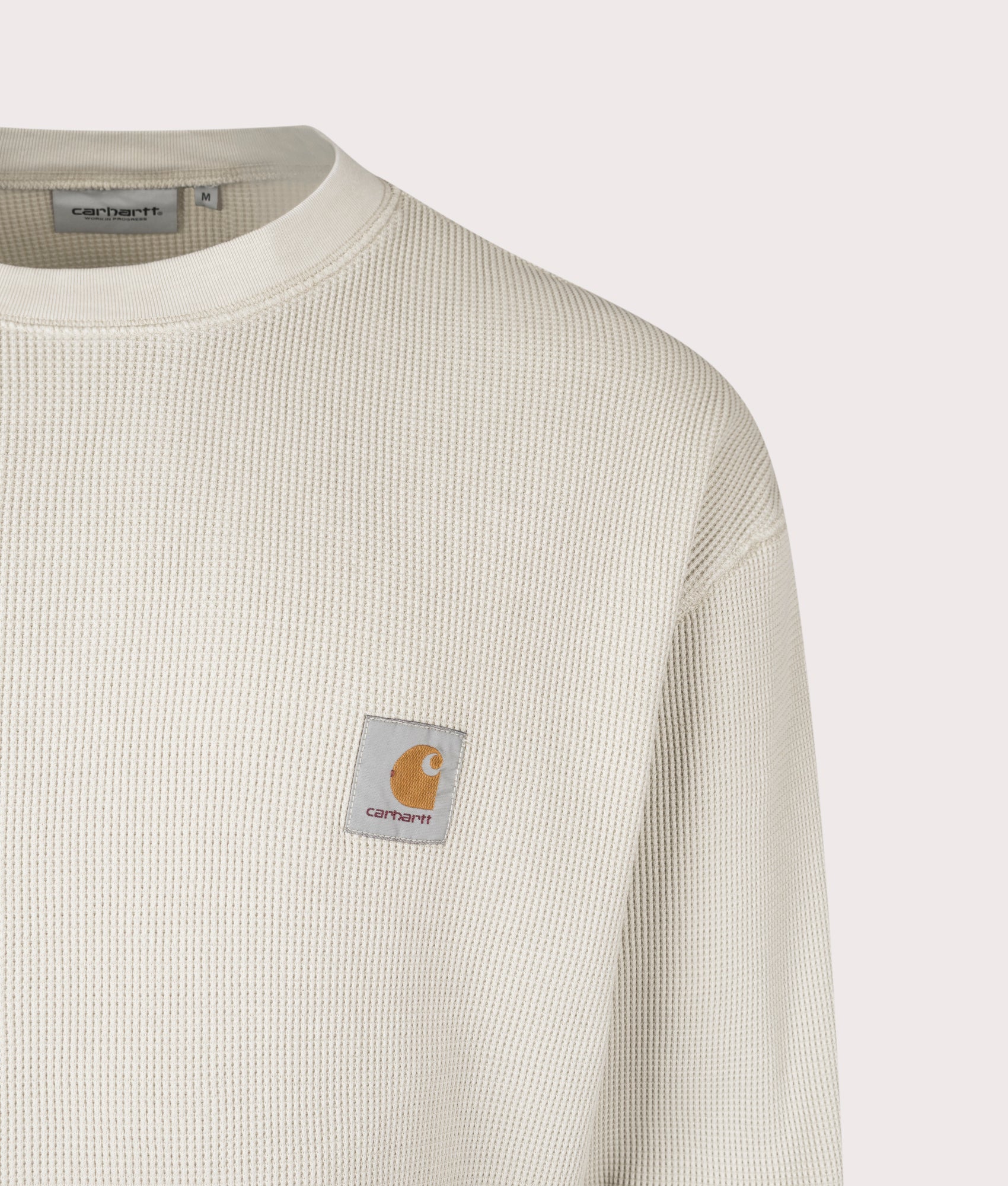 Carhartt WIP Long Sleeve Vista Waffle T-Shirt in Fleur De Sel at EQVVS Menswear. Detail shot. 
