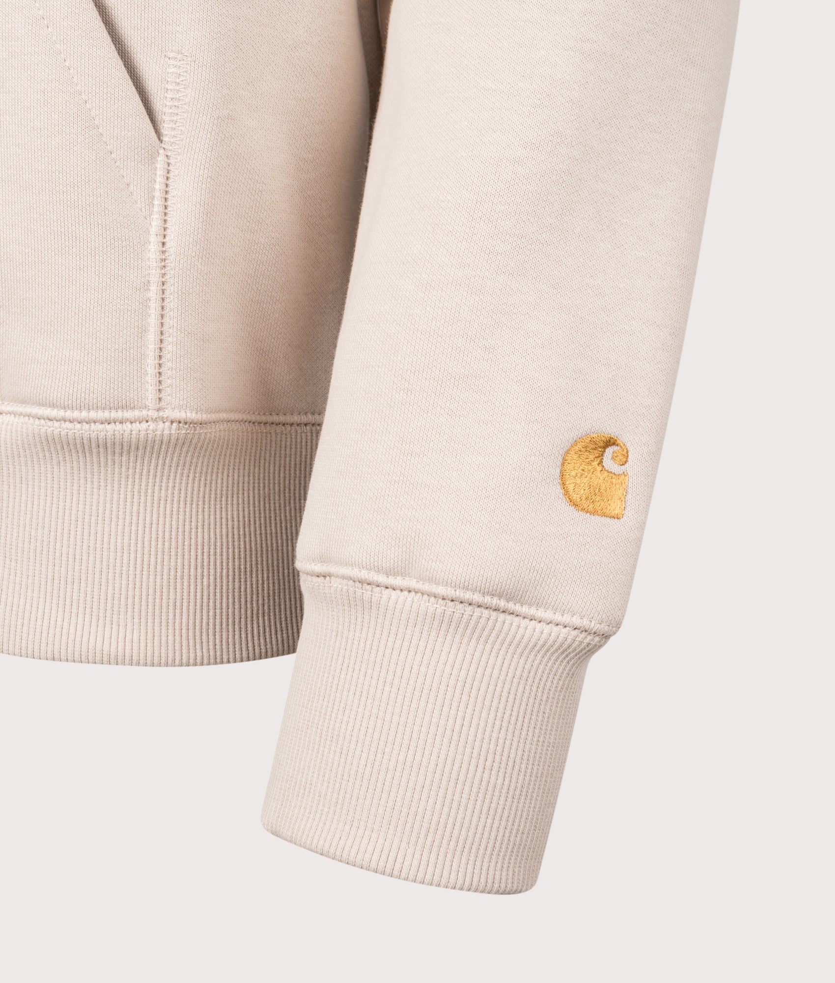 Carhartt WIP Chase Hoodie in Fleur De Sel and Gold at EQVVS Menswear. Detail shot.