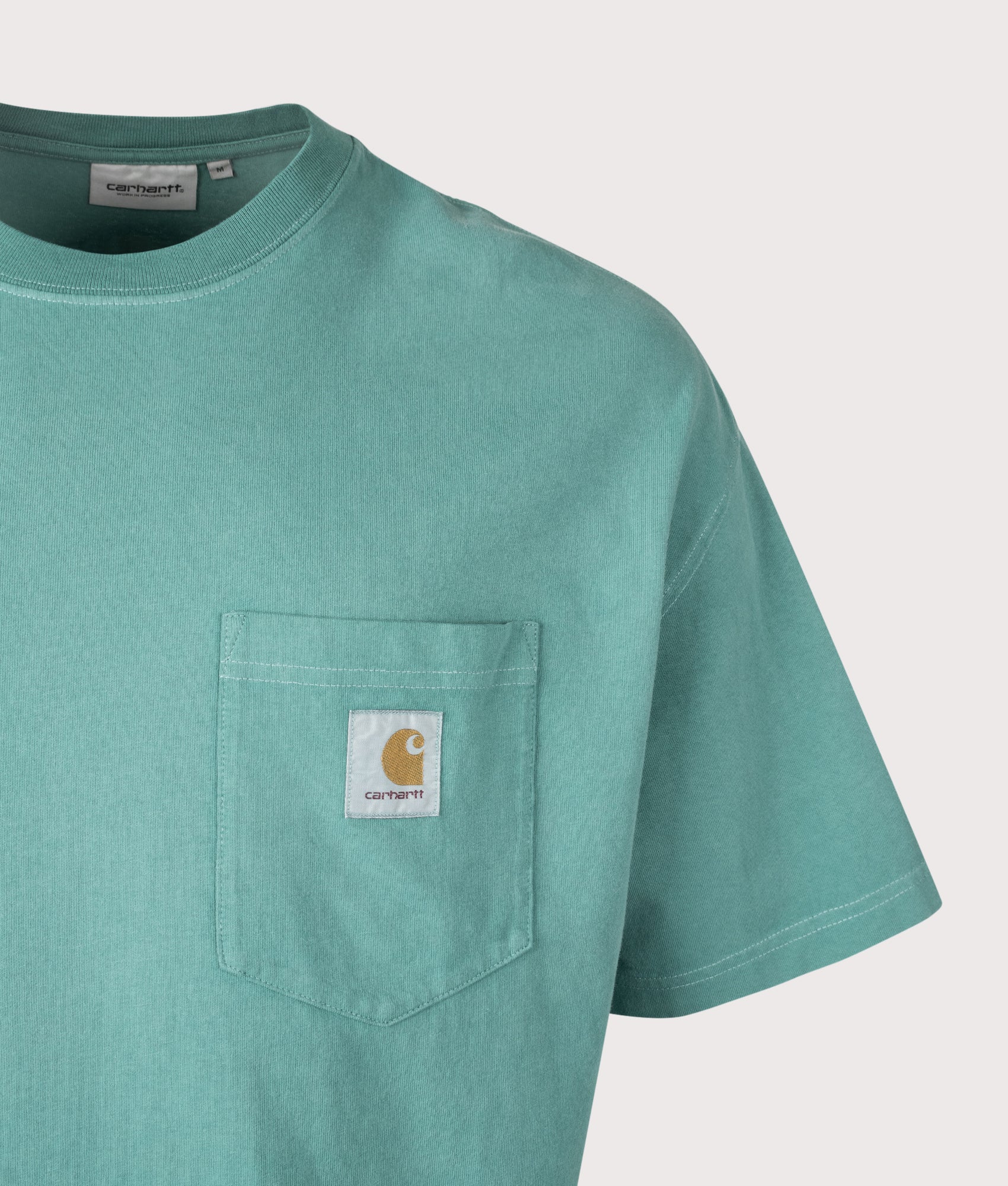 Carhartt WIP Boxy Loose Fit Hudson Pocket T-Shirt in Saguaro at EQVVS Menswear. Detail Shot.