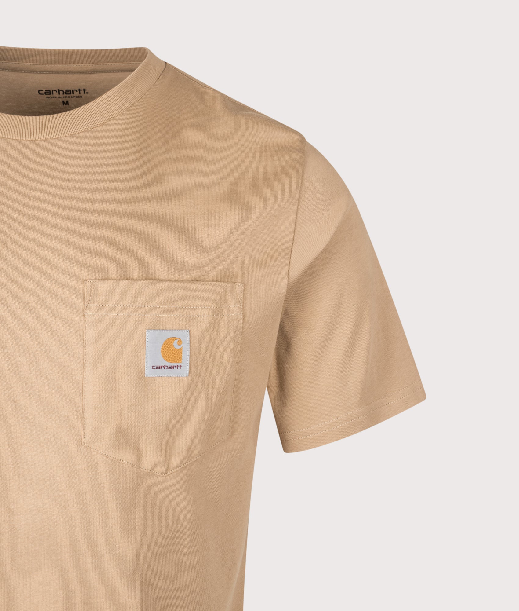 Relaxed Fit Pocket T-Shirt in Peanut. 100% Cotton | Carhartt WIP | EQVVS | Front detail shot 