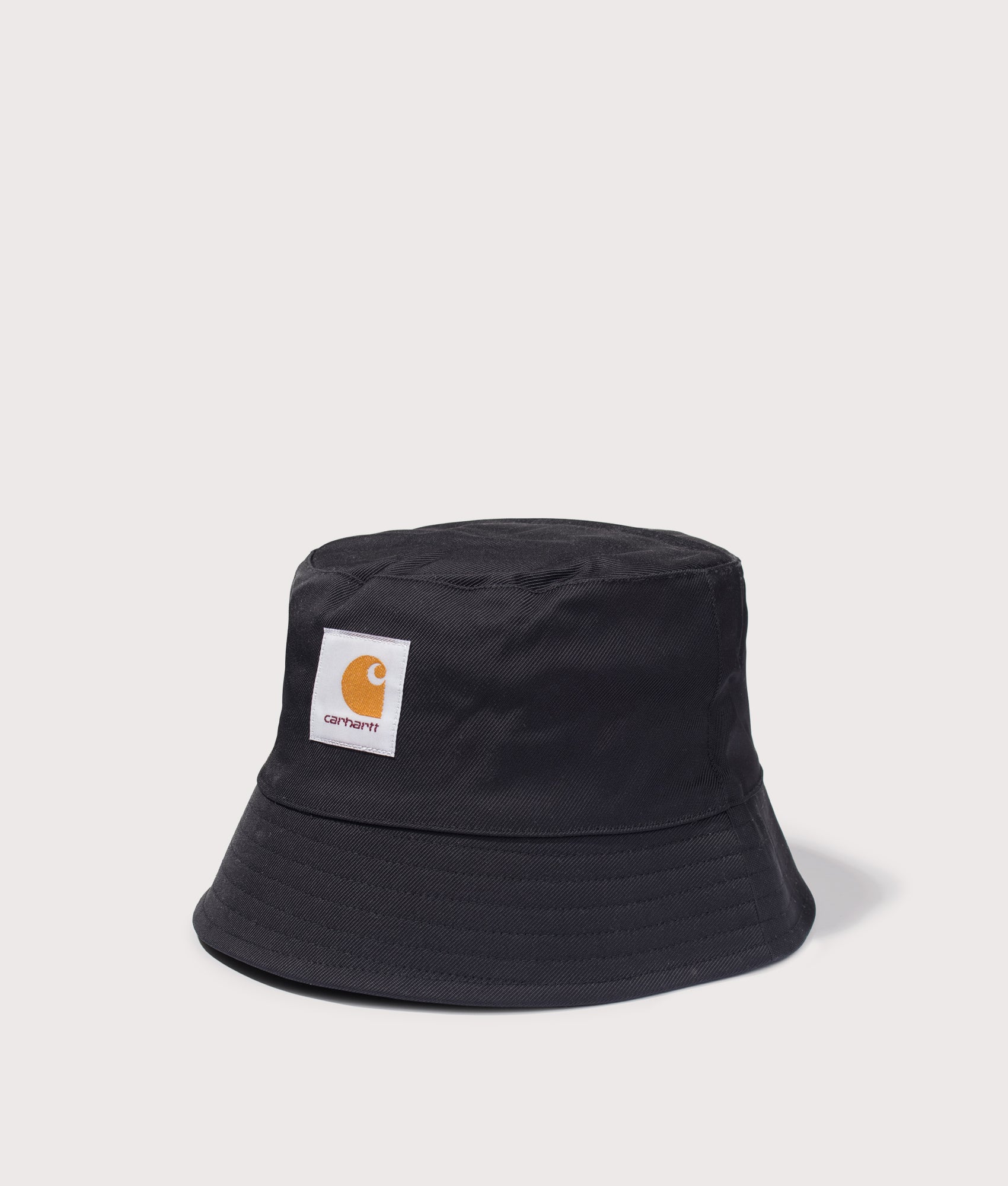 Carhartt WIP Leroy Bucket Hat in Black at EQVVS Menswear. Angled front shot.