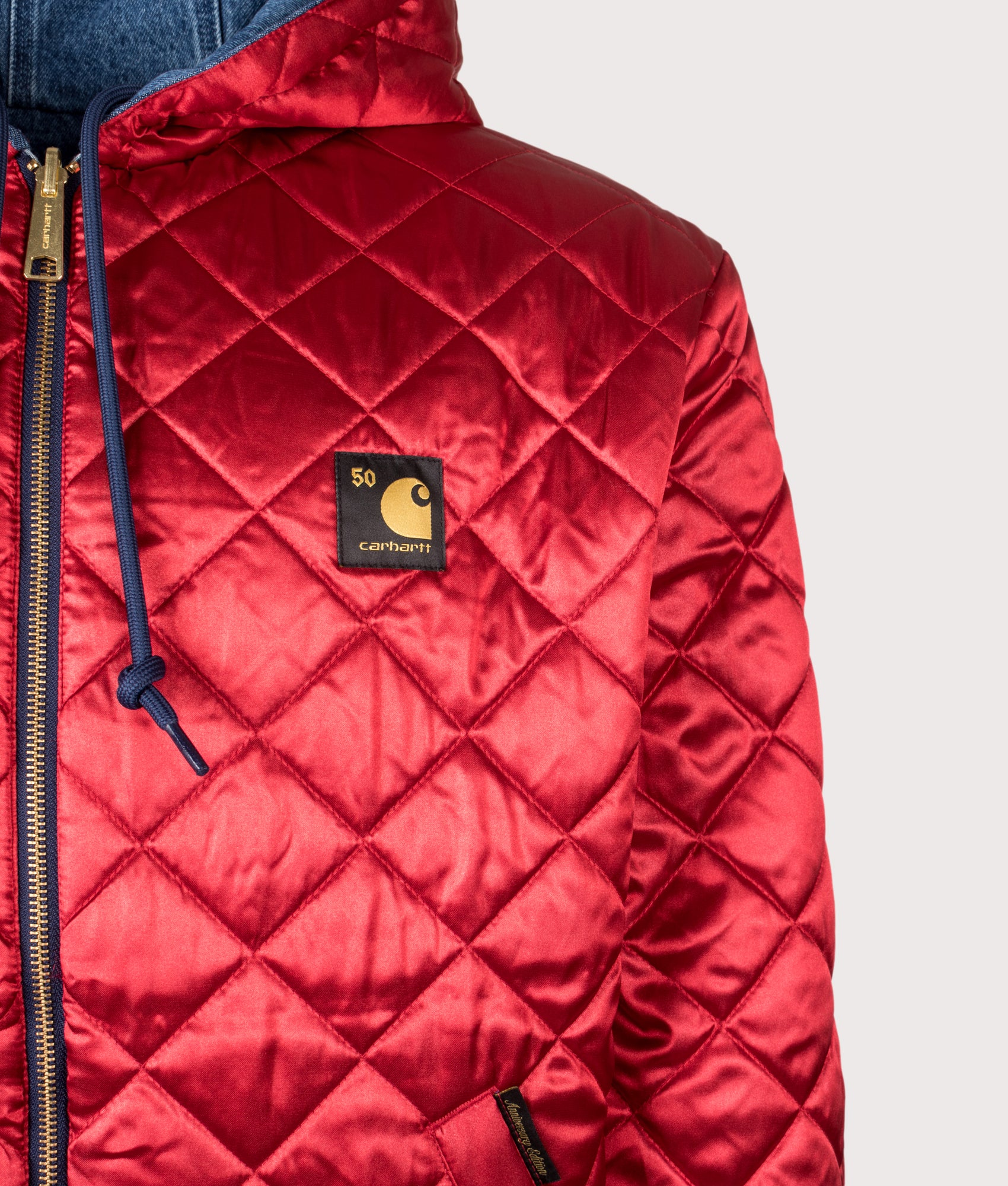 Carhartt WIP 50 Years Anniversary OG Active Denim Reversible Jacket in Blue/USA Red at EQVVS Menswear. Side B detail shot.