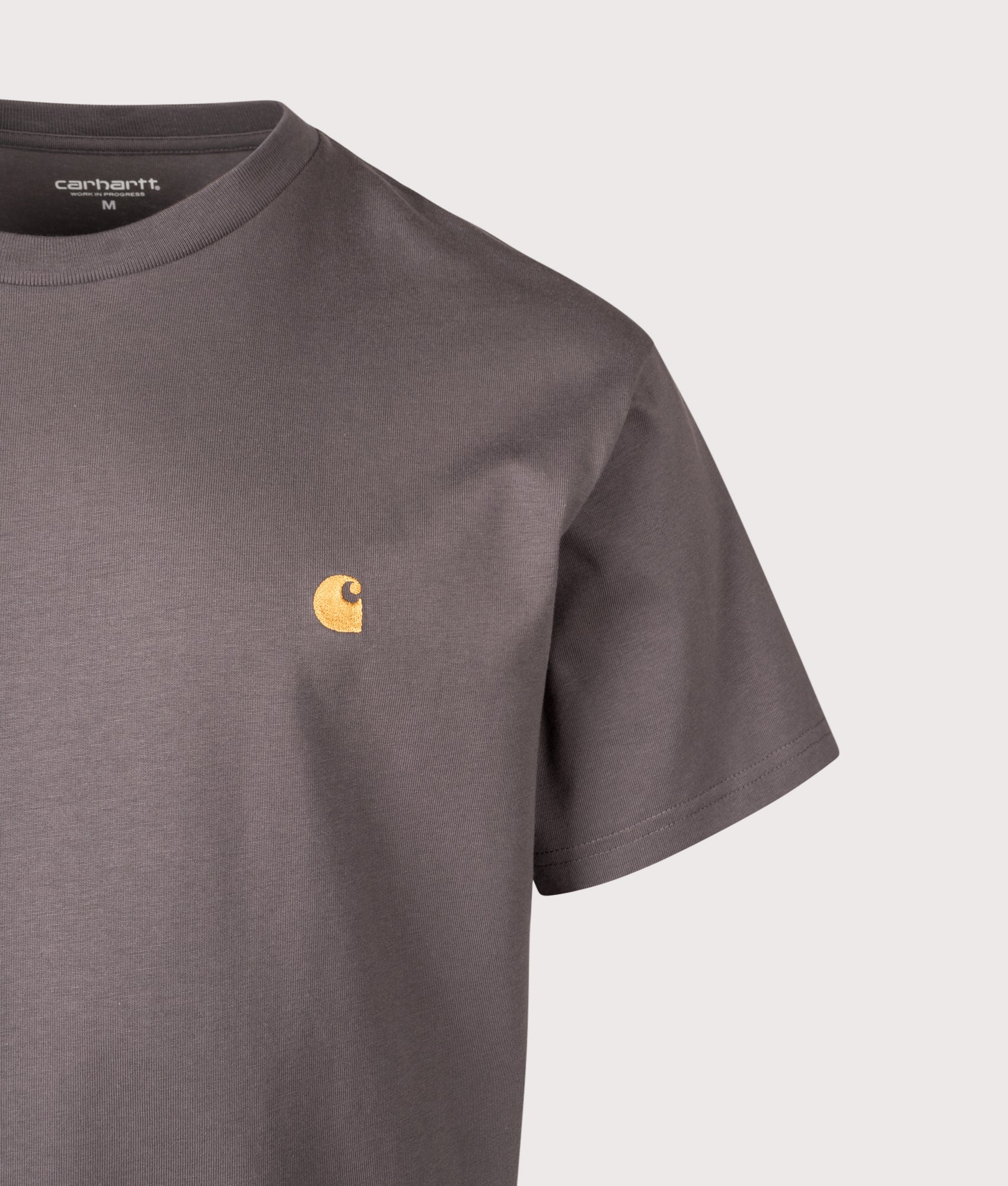 Carhartt WIP Loose Fit Chase T-Shirt in Porphyry/Gold at EQVVS Menswear. Details shot.