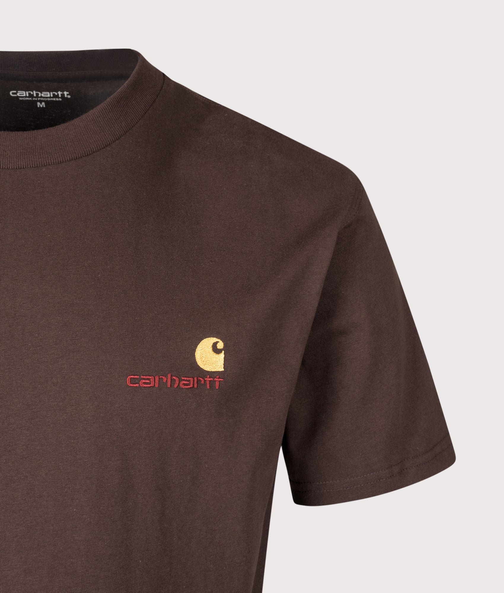 Carhartt WIP Loose Fit American Script T-Shirt in Palisander at EQVVS Menswear. Detail shot.