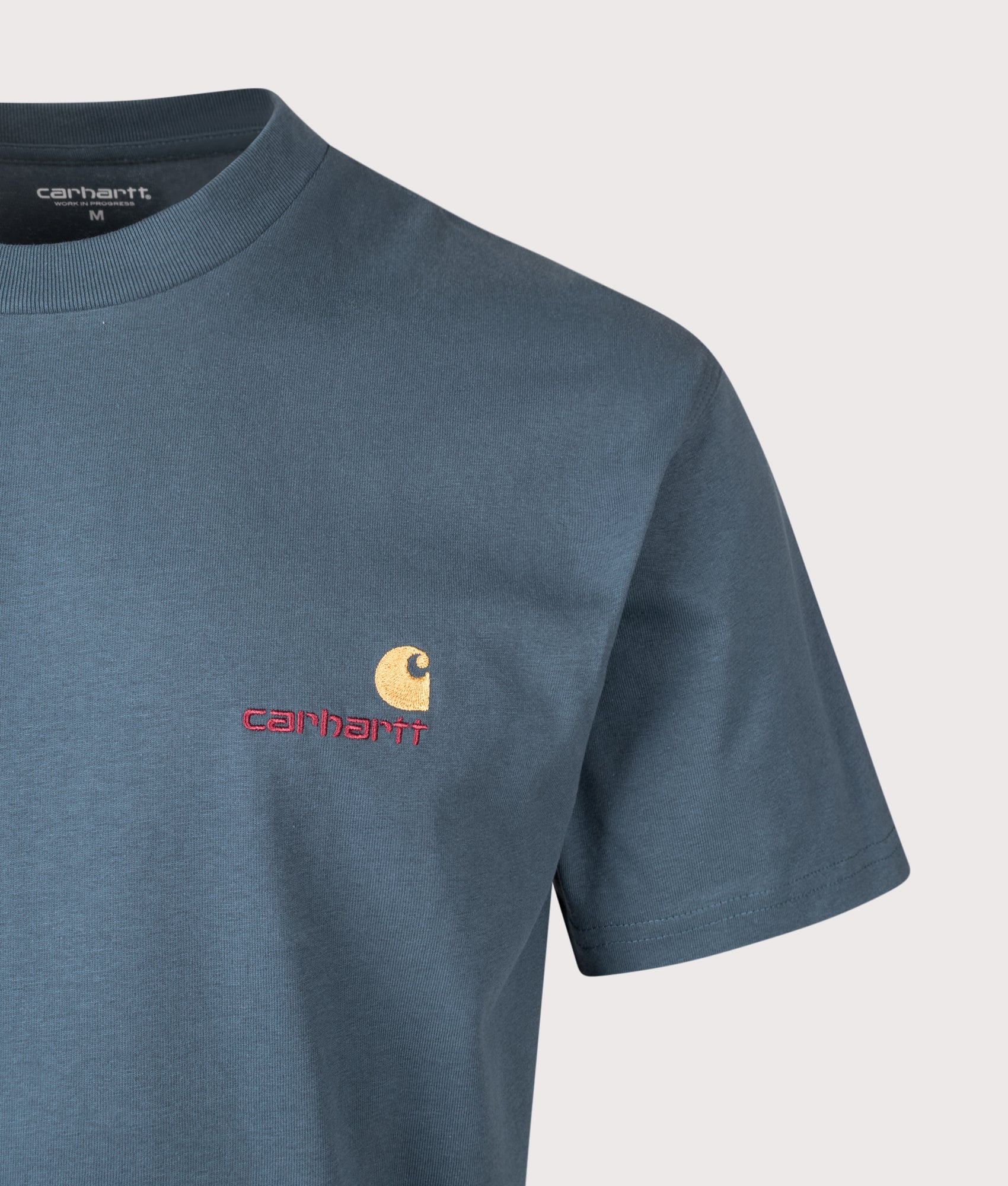 Carhartt WIP Loose Fit American Script T-Shirt in Office Blue at EQVVS Menswear. Detail shot. 