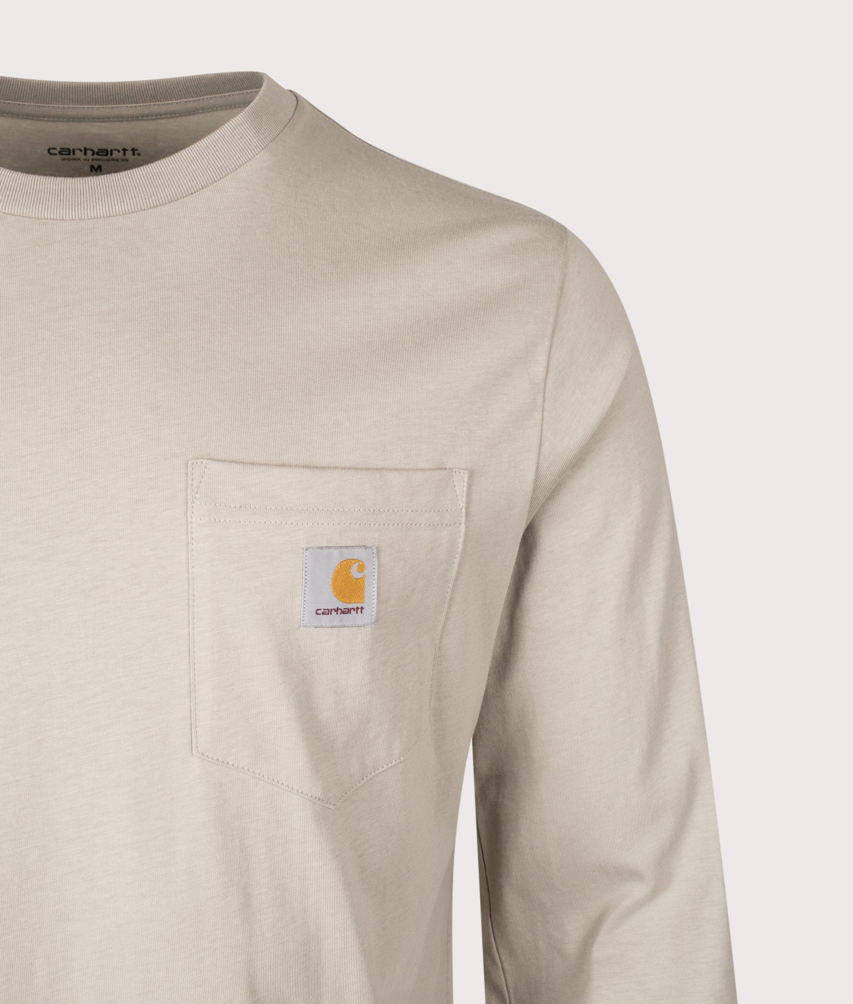 Carhartt WIP Pocket Long Sleeve T-Shirt in Puddle at EQVVS Menswear. Detail shot.