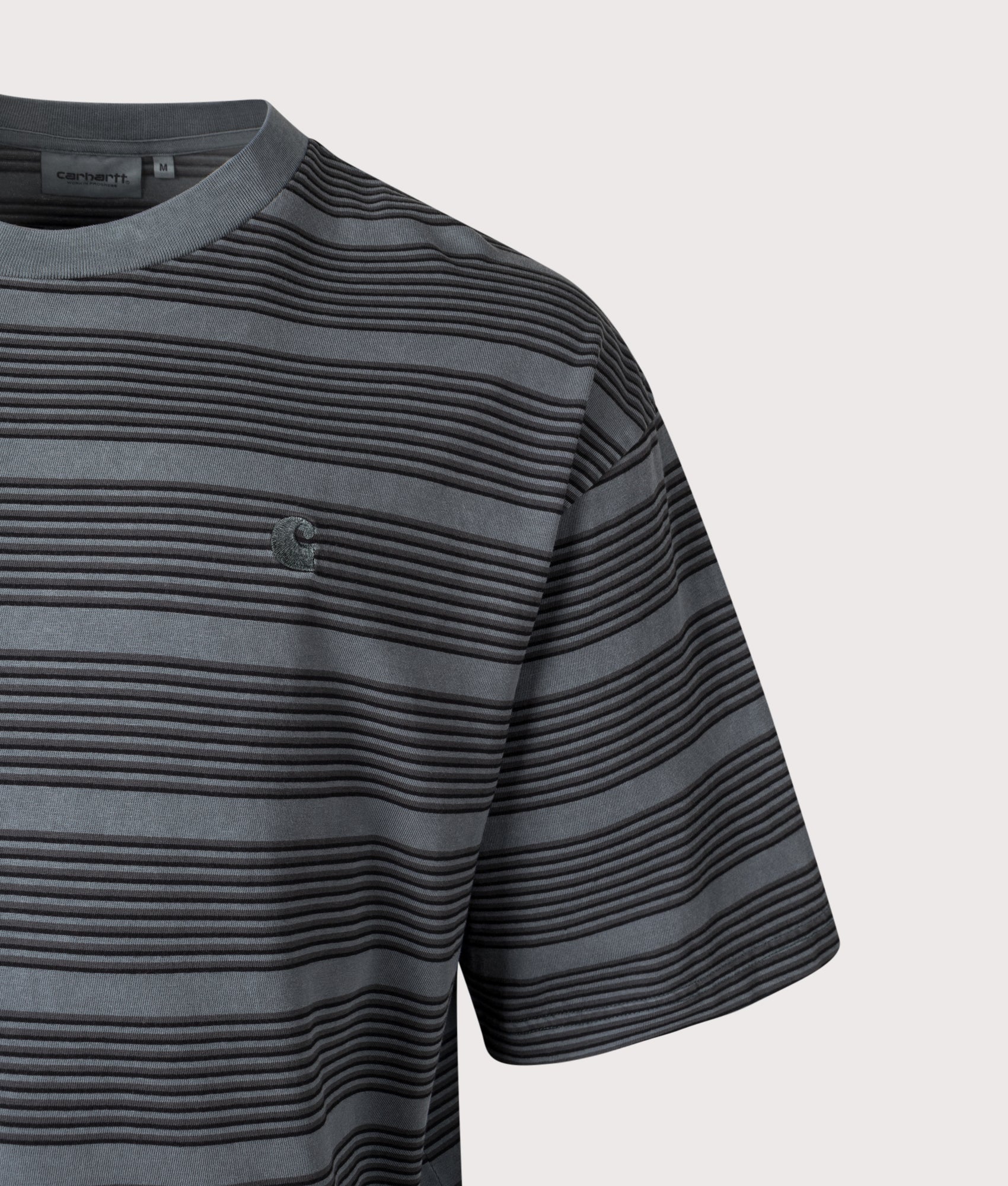 Carhartt WIP Loose Fit Hanson T-Shirt in Hanson Stripe/Kale Green at EQVVS Menswear. Front detail shot. 