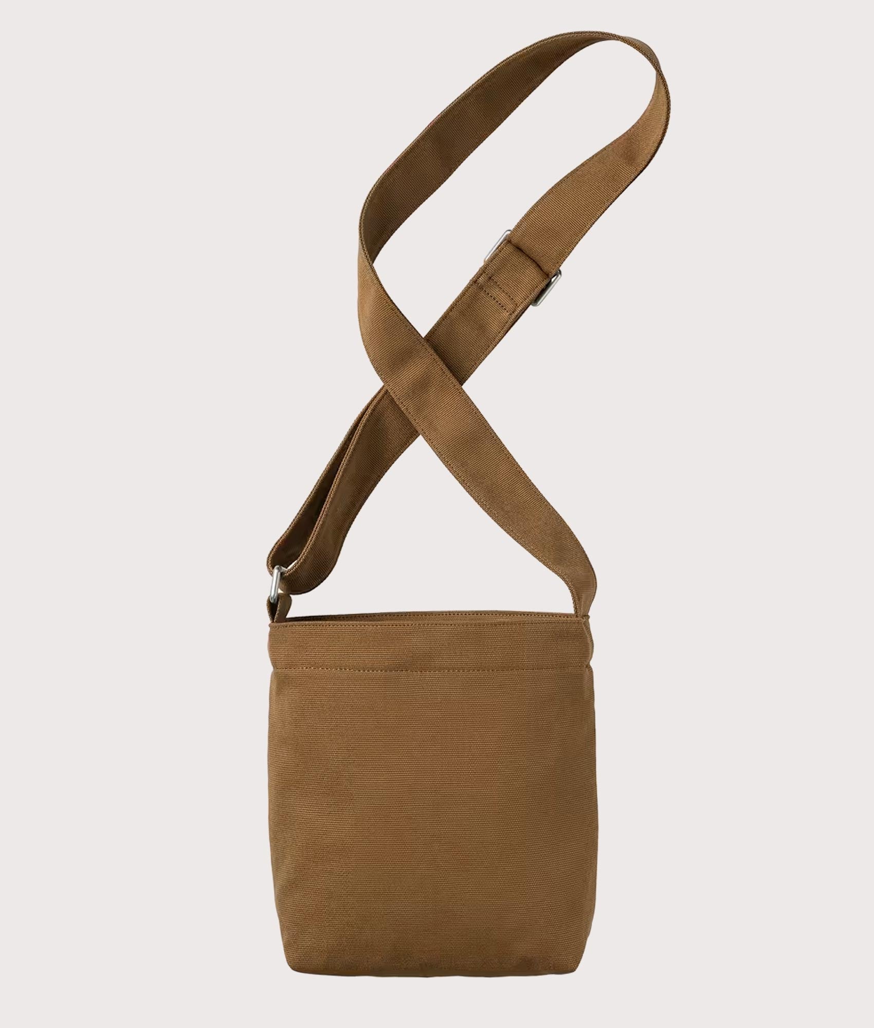 Carhartt WIP Canvas bag in Hamilton Brown at EQVVS Menswear. Back shot.