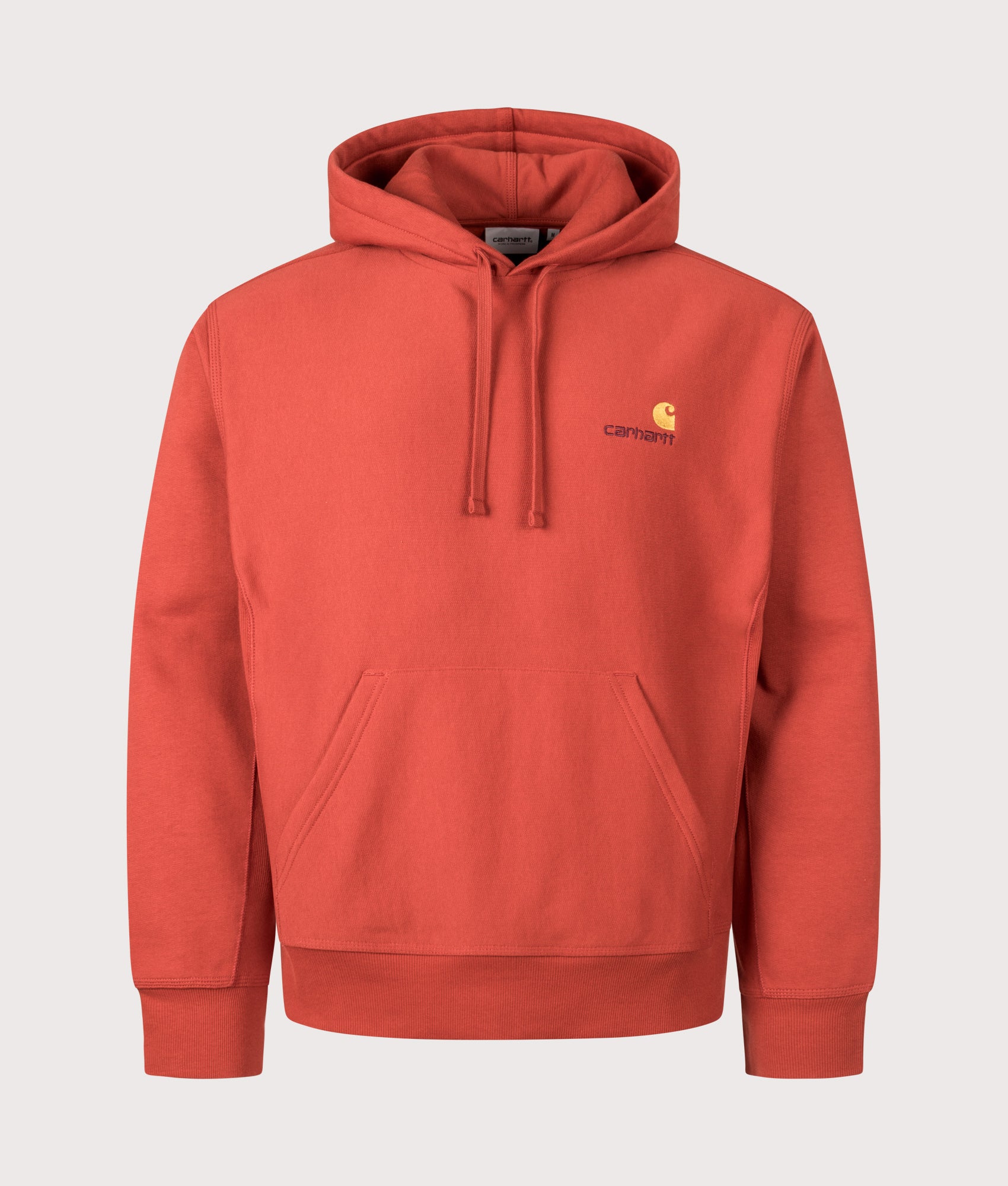 Carhartt WIP Boxy Loose Fit American Script Hoodie in Oxide Red at EQVVS Menswear. Front shot.