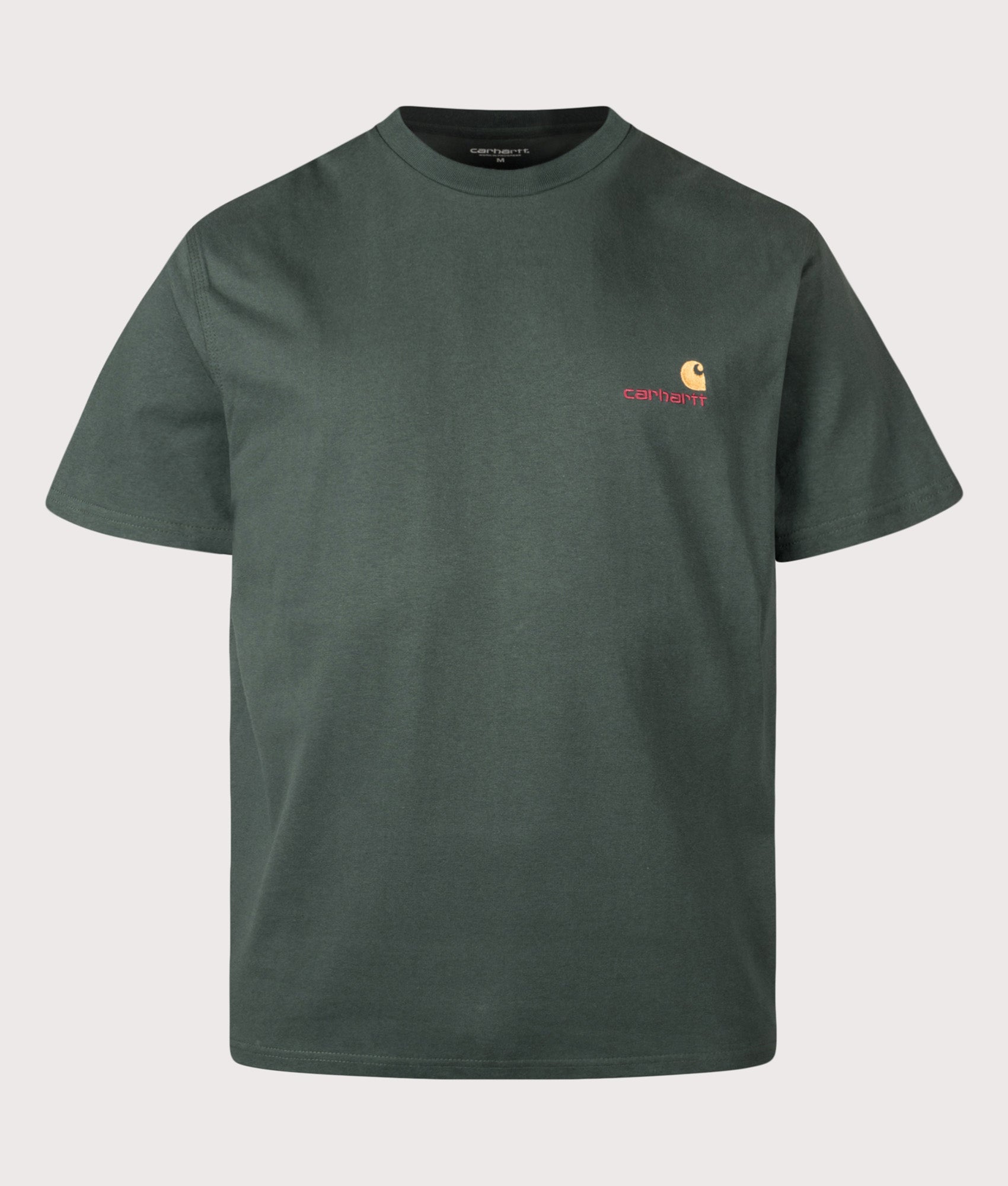 Carhartt WIP Loose Fit American Script T-Shirt in Kale Green at EQVVS Menswear. Front shot.